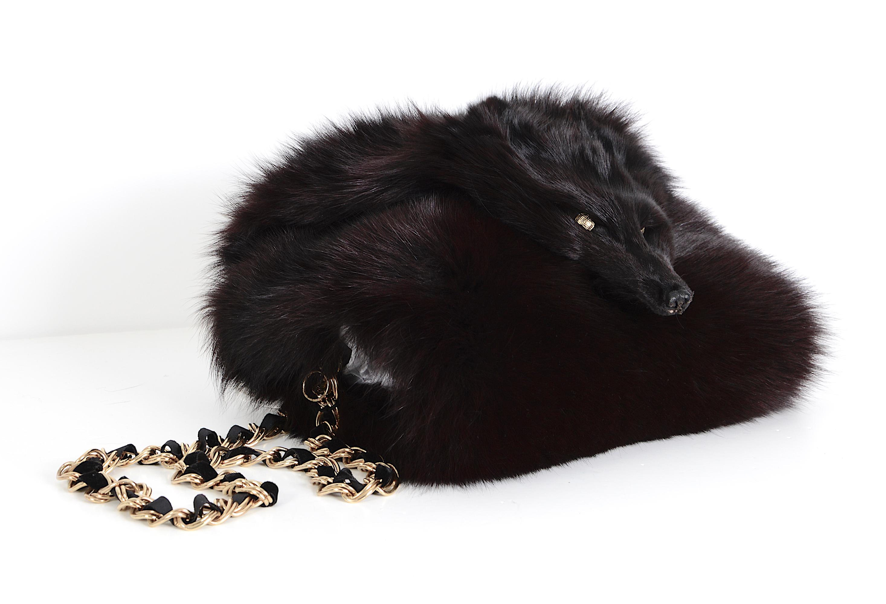 Black Yves Saint Laurent vintage rare gold chain black fox fur handwarmer muff bag