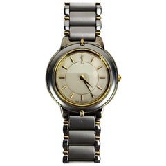 Yves Saint Laurent Montre ronde vintage pour femme 4620-E62267