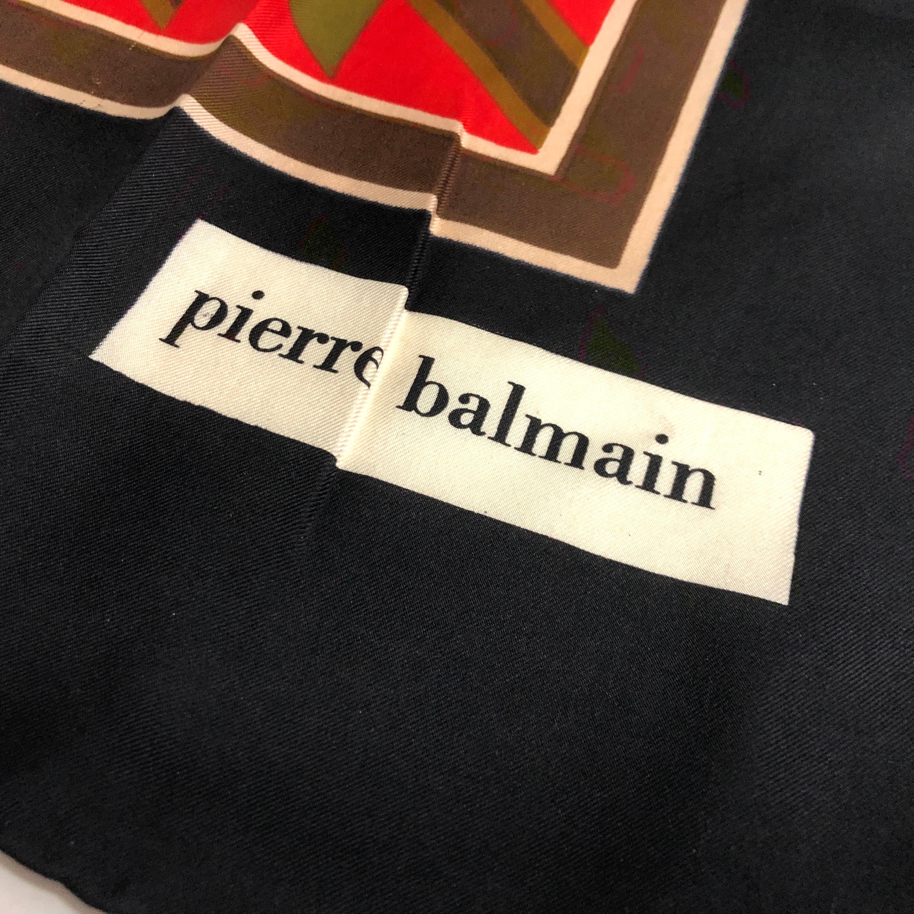 A red, blue and gold silk  square foulard by Pierre Balmain in perfect conditions