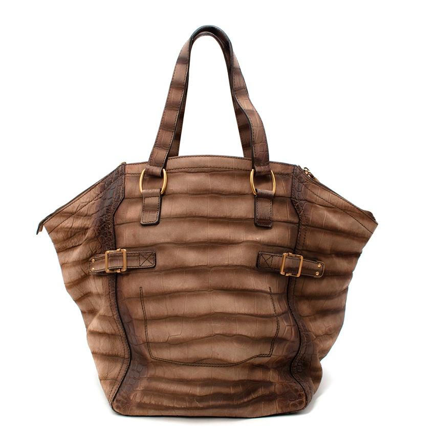  Yves Saint Laurent Vintage Tan Crocodile Embossed Downtown Bag
 

 - Embossed crocodile effect leather in tones of brown and tan 
 - Gold-tone metal hardware throughout 
 - Hanging clochette
 - Lined in black satin 
 

 Materials:
 Leather
 Satin
