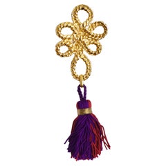 YVES SAINT LAURENT Pendentif broche vintage à pompons