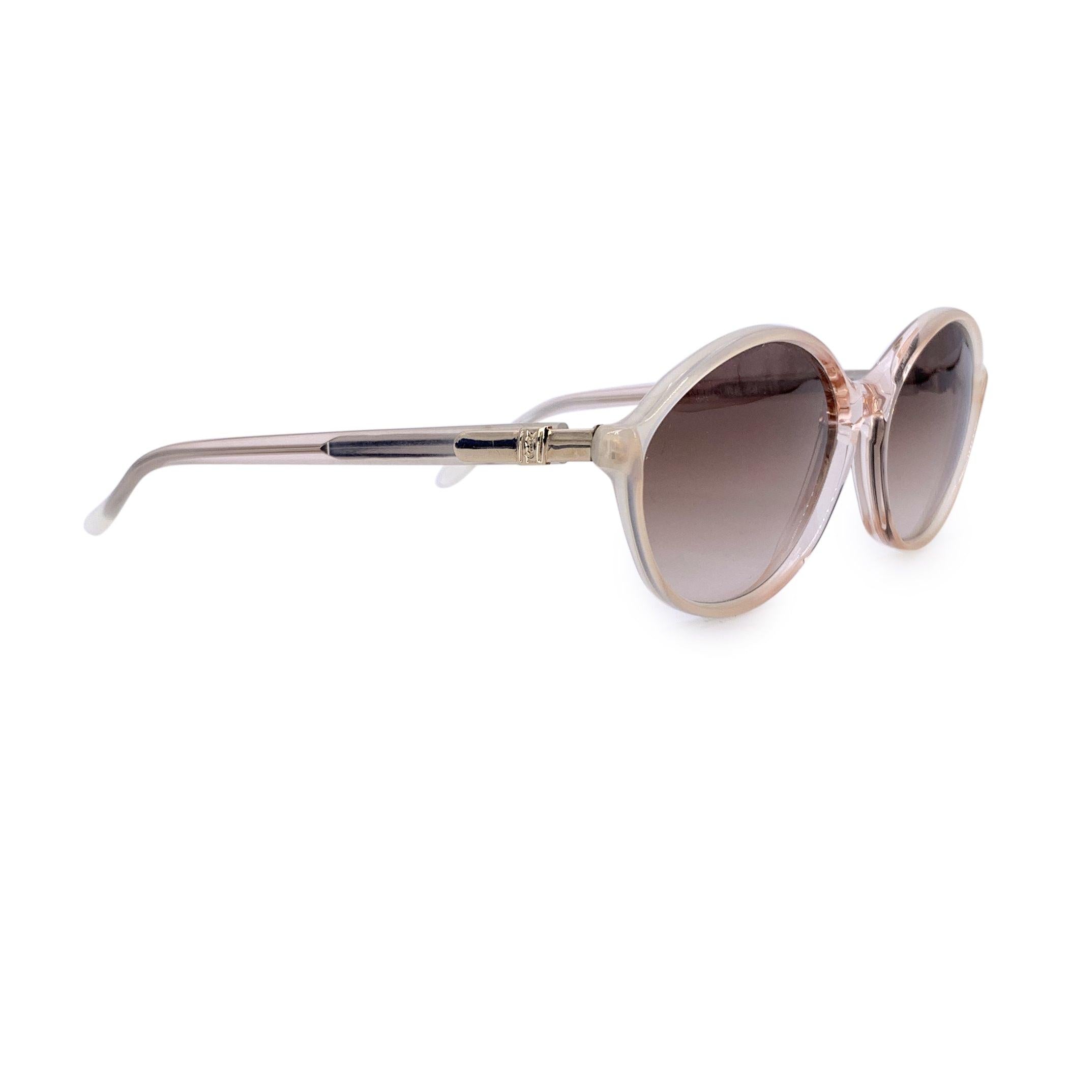 Bold yet refined, the Yves Saint Laurent MERCURE vintage sunglasses are a stellar expression of 1980s elegance with a forward-thinking edge. Made in France, this beautiful model reflects YSL's fearless approach to glamour-where sharp lines met soft