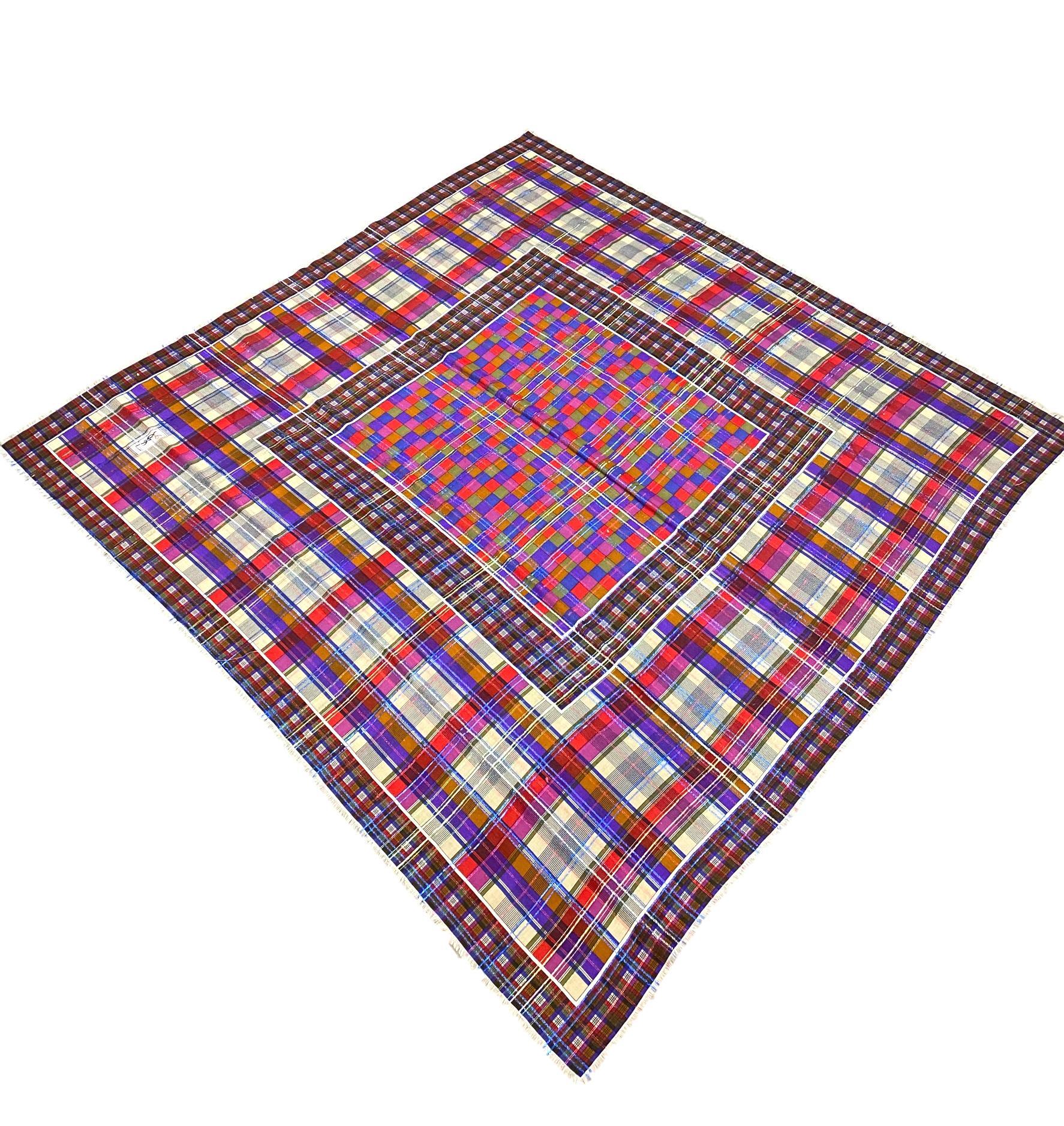 Yves Saint Laurent Vintage Wool Challis & Silk Checkered Plaid Pattern Scarf, Circa 1970 - 1980. This beautiful and classic plaid patterned scarf by Yves Saint Laurent comes in a vibrant magenta, red and purple coloration cross-sectioned with blue