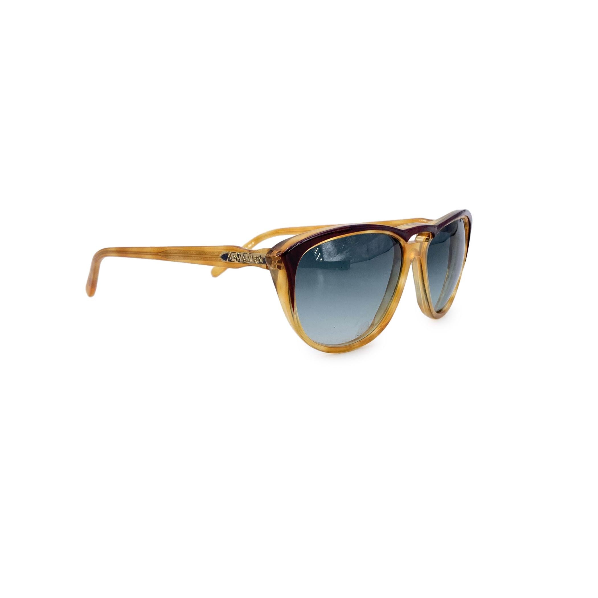 Bright, bold, and irresistibly chic, these Yves Saint Laurent Vintage Yellow Sunglasses are a radiant throwback to the expressive style of the 1980s. Made in France and expertly crafted from high-quality plastic, this cat-eye model channels the