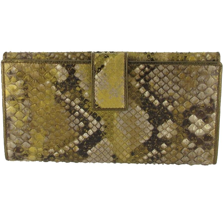 Sublime Yves Saint Laurent golden python wallet, with 2 compartments, a compartment for bills closed by a golden metal and python lock, a compartment closed by press stud with 12 slots for credit cards. The golden leather interior is carefully