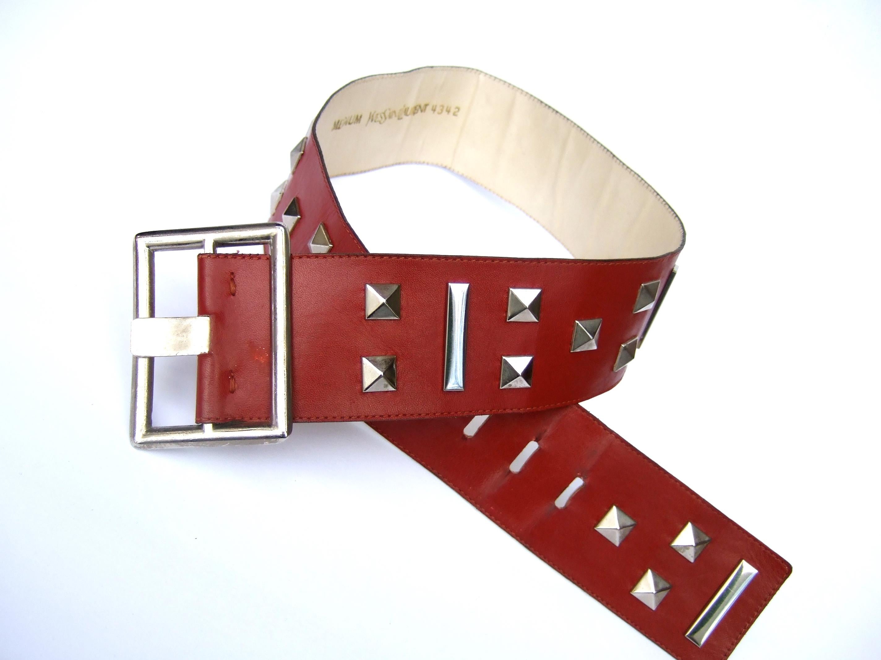 Brown Yves Saint Laurent Wide Red Leather Chrome Grommet Studded Belt c 1970s For Sale