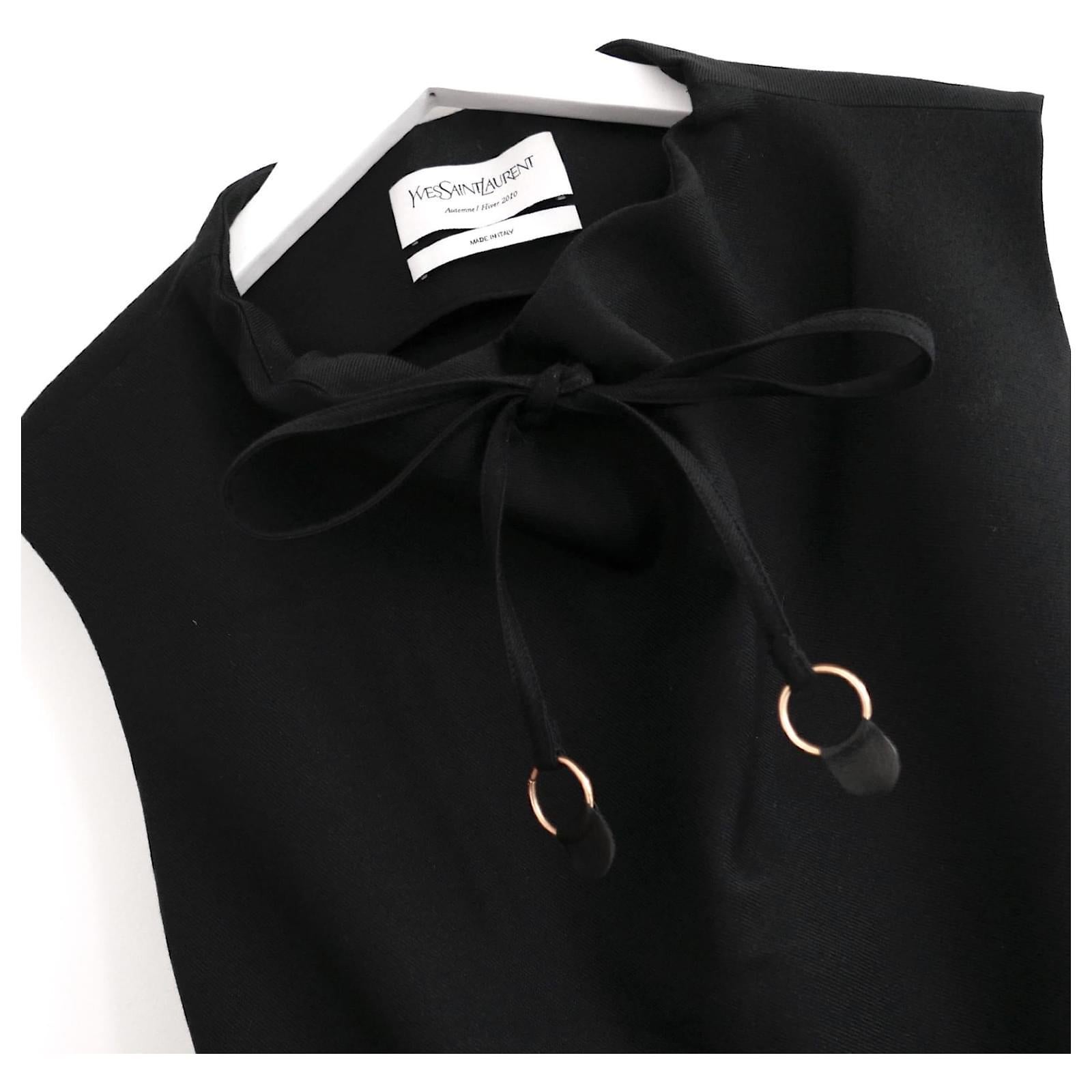 Stunning archival Yves Saint Laurent top from Stefano Pilati's Spring Fall 2010 Collection. 

Bought for £1250 and unworn. Made from semi structured black wool and silk, it is beautifully tailored with darted bodice and lined layered peplum hem. Has