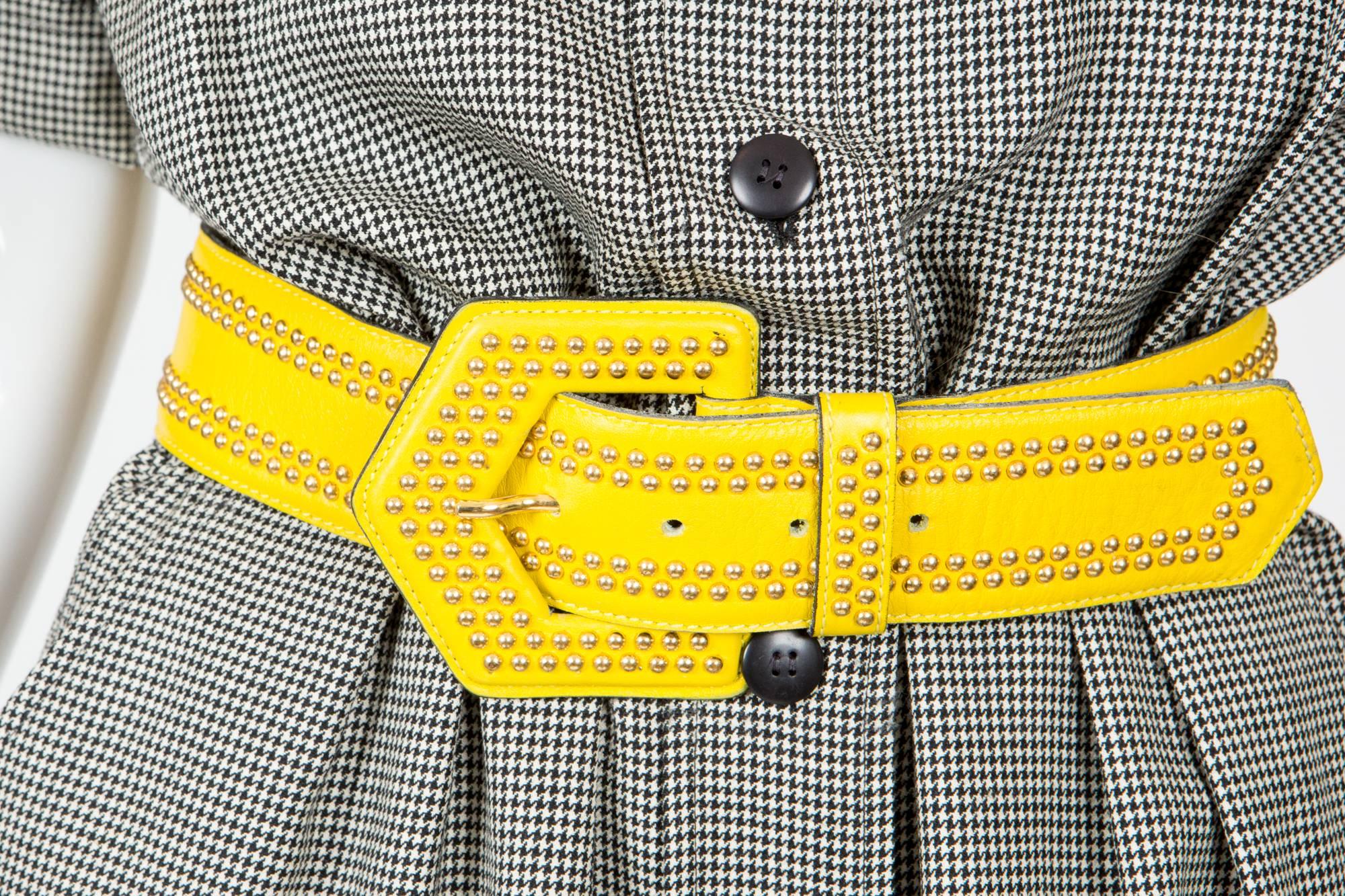 Yves Saint Laurent yellow leather belt featuring  gold tone studs, an inside white leather lining. 
In excellent vintage condition. Made in France.
Estimated size  75 cm
We guarantee you will receive this gorgeous item as described and showed on