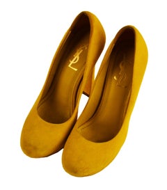 Yves Saint Laurent yellow suede pumps