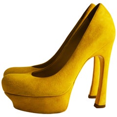 Yves Saint Laurent yellow suede pumps