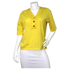 Yves Saint Laurent Yellow V-Neck Tee With Shell Motif Buttons circa 1980s Yves Saint Laurent Yellow V-Neck Tee With Shell Motif Buttons circa 1980s