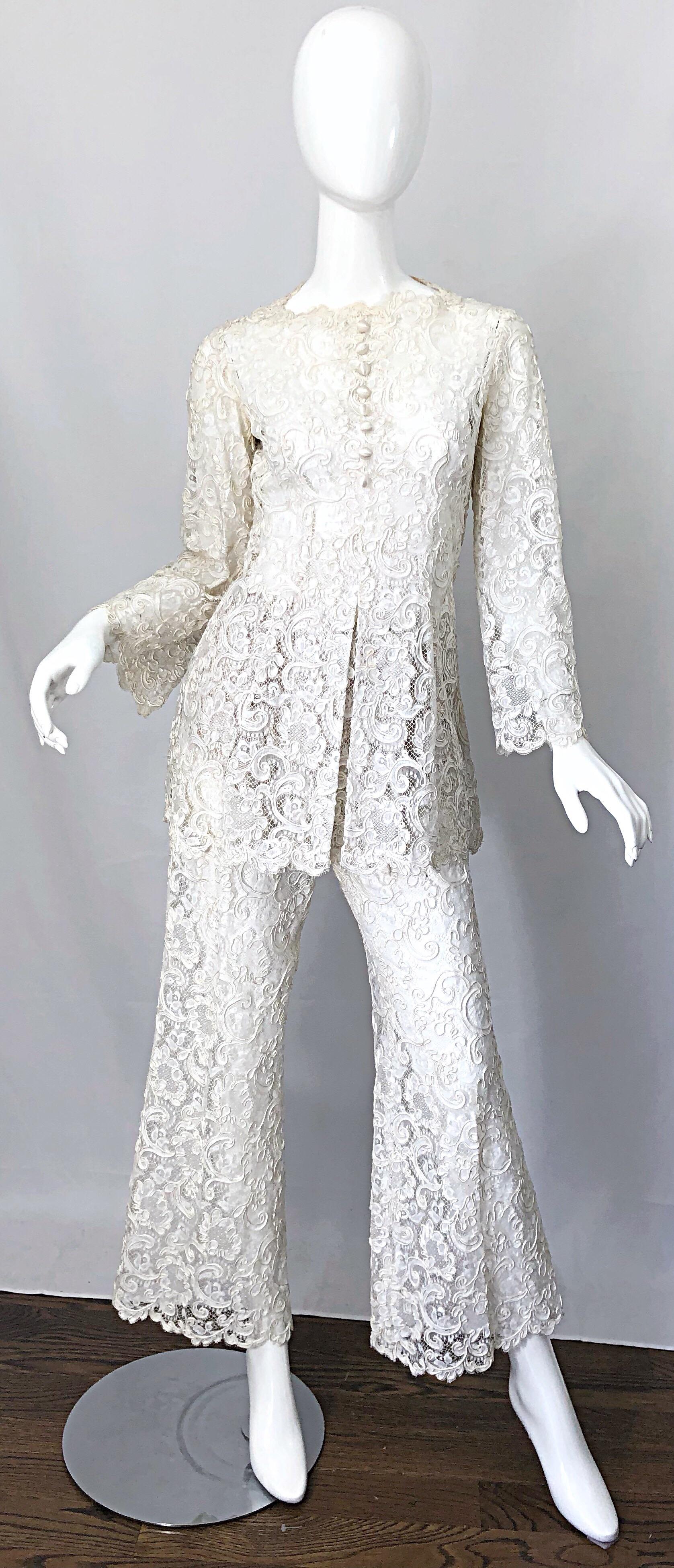 Amazing and Rare vintage YVES SAINT LAURENT 1970s ivory / off - white Belgium lace two piece ensemble! This is seriously one of my favorite YSL pieces ever! The workmanship is insanely good, and mirrors that of haute couture. Semi-sheer ivory lace.