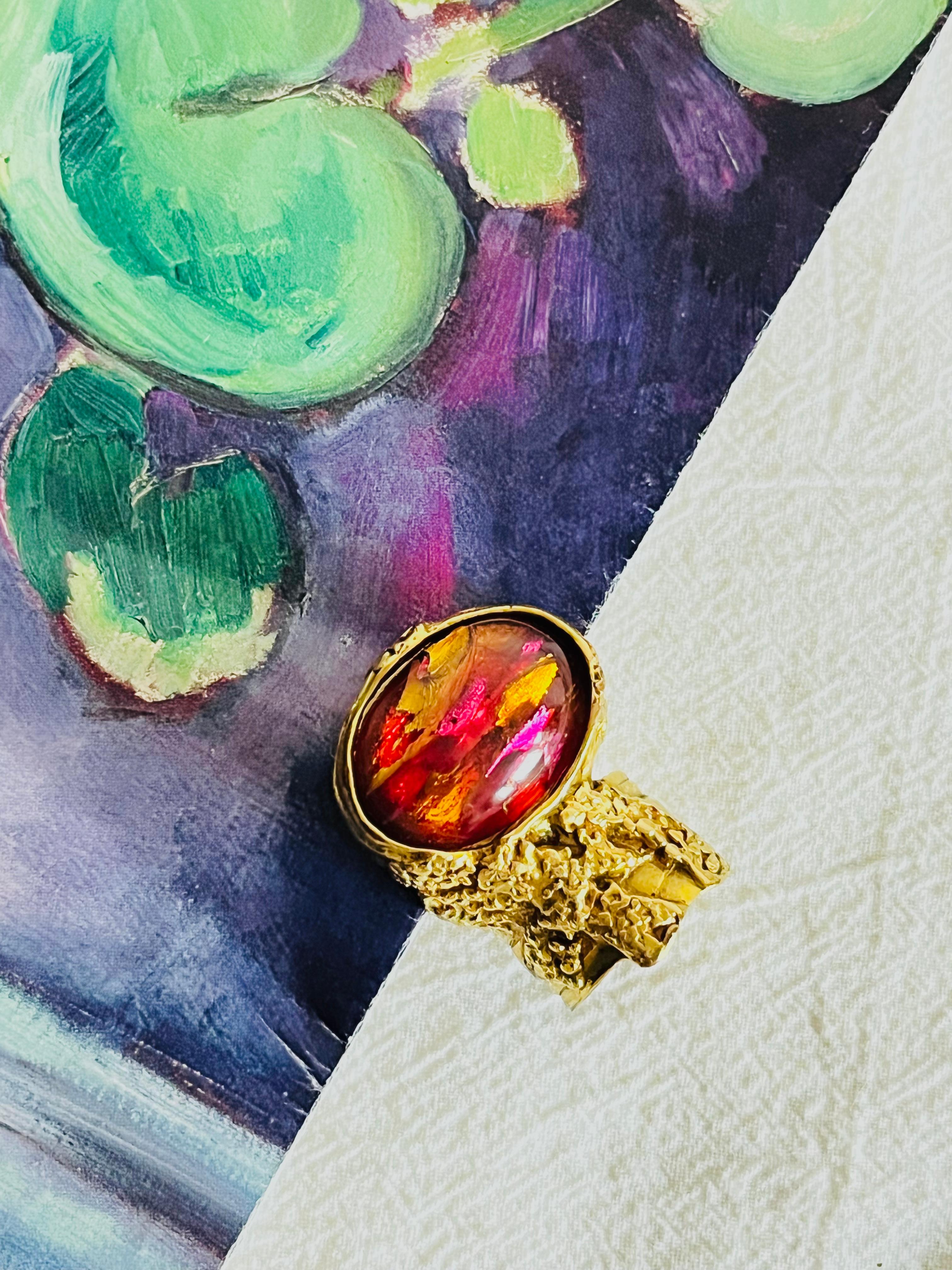 Yves Saint Laurent YSL Arty Clear Icy Ruby Foil Cabochon Statement Ring, Size 6, Gold Tone

Very good condition. Vintage. 100% genuine.

Very light scratches or colour loss. Signed on the back YSL, Made in France.

UK L/M.

_ _ _

Great for everyday