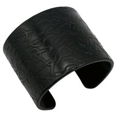Vintage YVES SAINT LAURENT YSL Black Resin Logo Cuff Bracelet