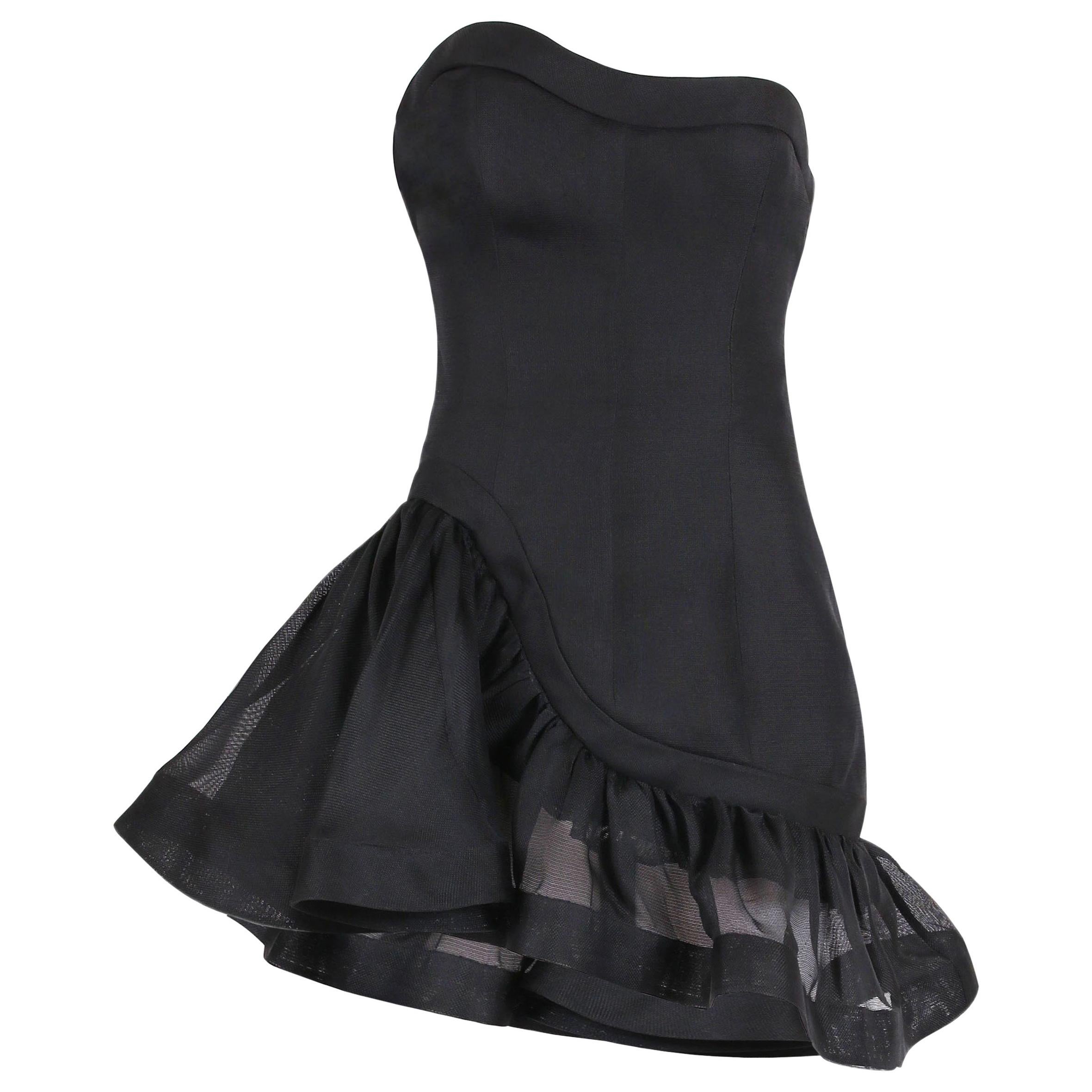 1980's YVES SAINT LAURENT fitted black dress with open back at 1stDibs