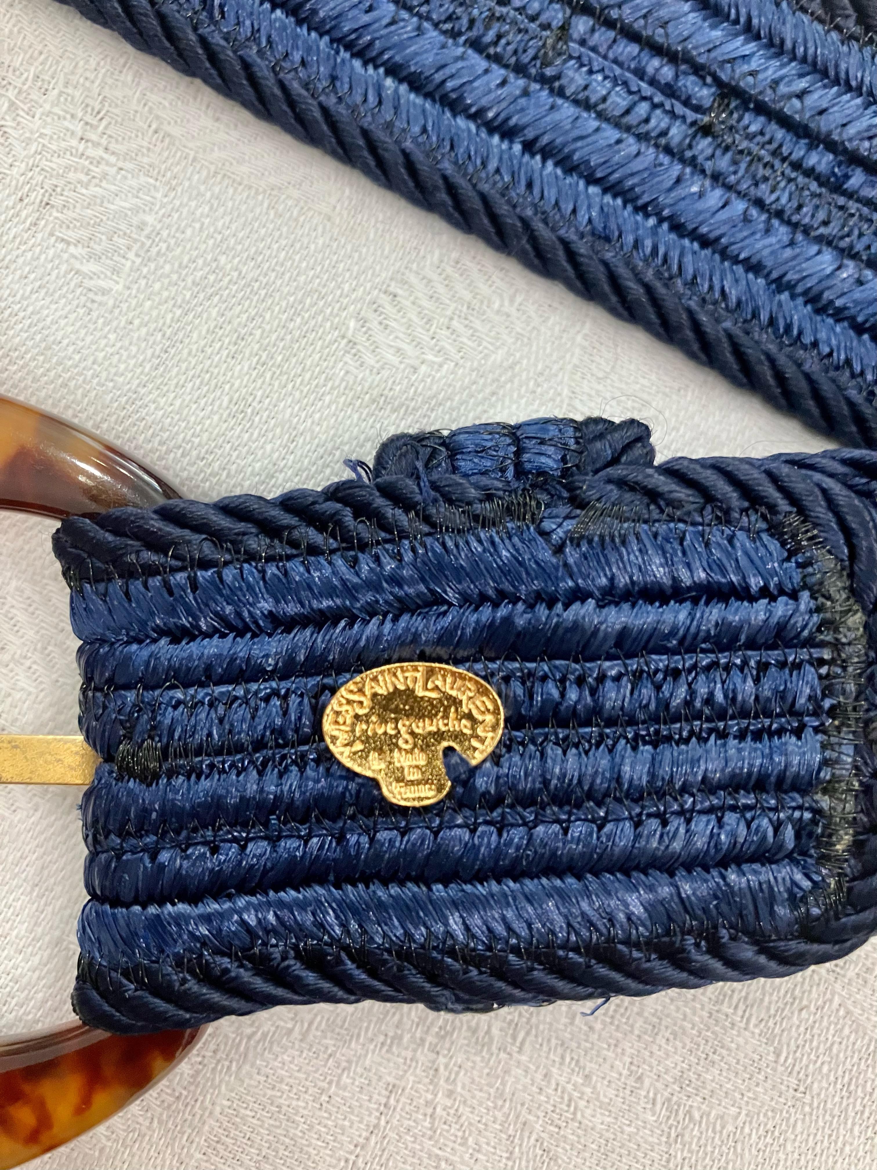 Blue Yves Saint Laurent YSL braided belt featuring a tortoise effect bakelite buckle  and an inside gold-tone YSL plaque.  
In good vintage condition. Made in France. 
Maxi Length (with the buckle) 36.2 in. (92cm) 
Width Width: 1.30in.