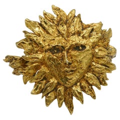 Yves Saint Laurent YSL par Robert Goossens, manchette emblématique vintage « Sun Face »