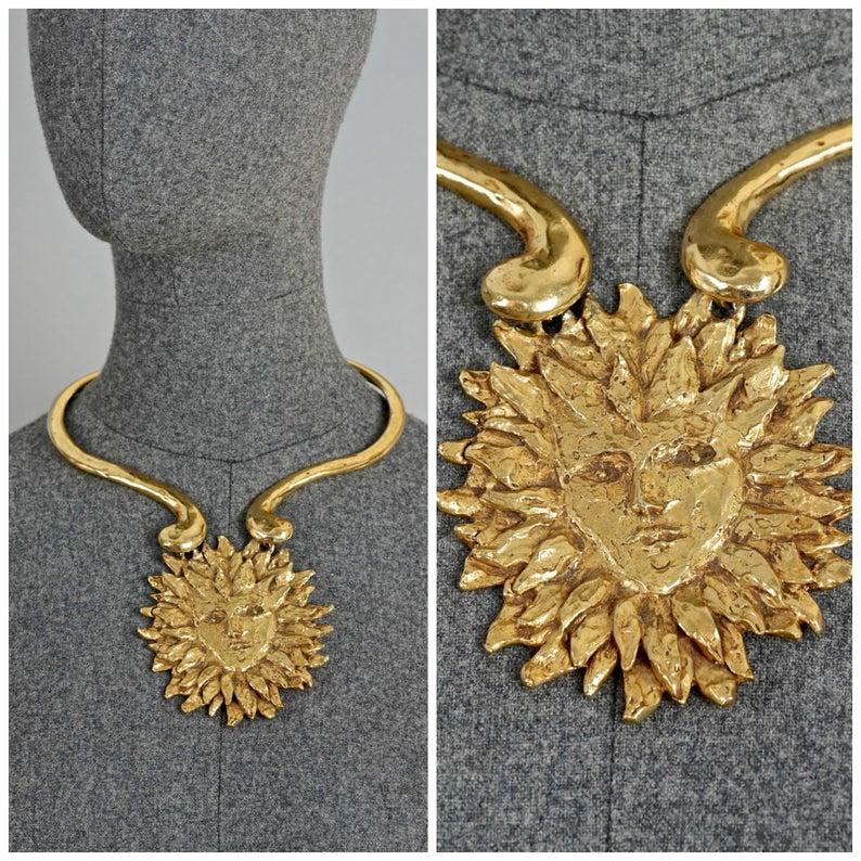 This Vintage Rare YVES SAINT LAURENT Sun Face Necklace is RARE and such a collector item. This was designed by Robert Goossens for YSL and was included in the Metropolitan Arts and Design Museum Exhibition on Fashion Jewelry -- The Collection of