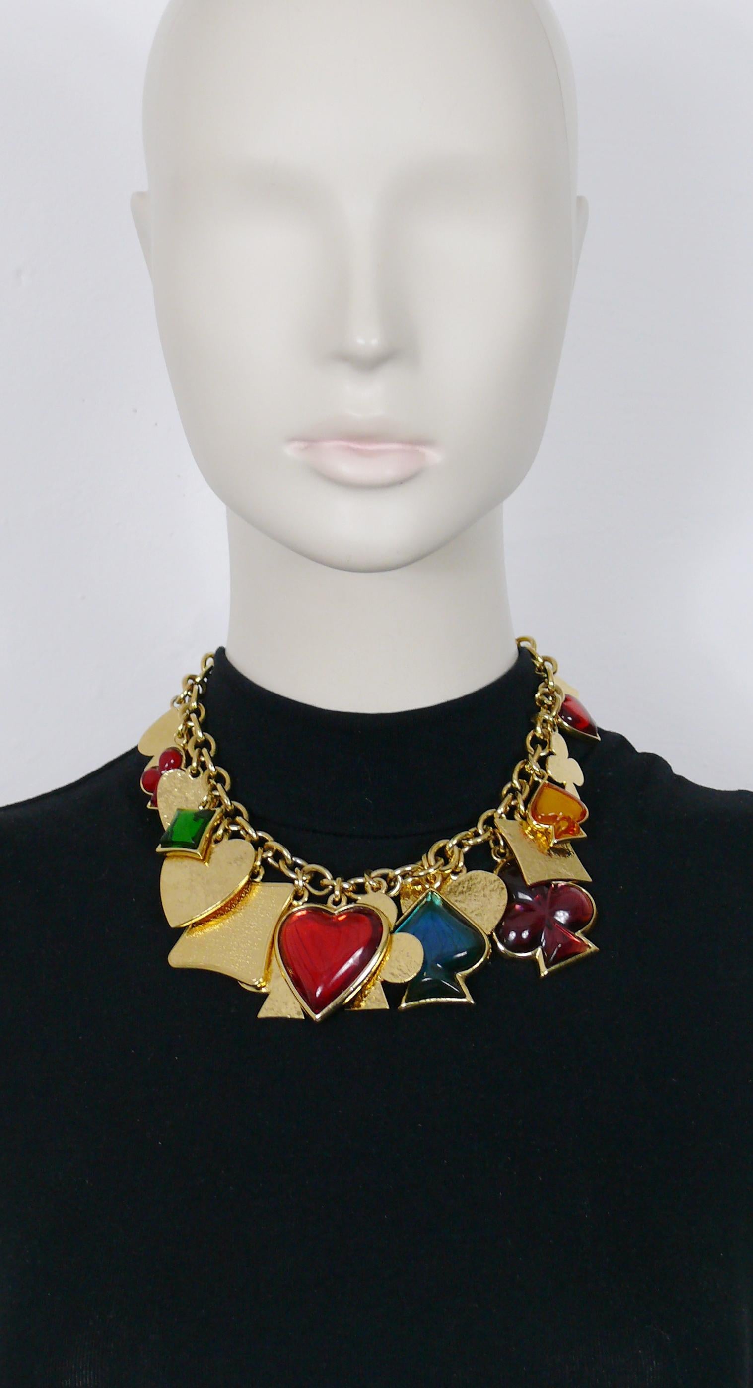 YVES SAINT LAURENT by ROBERT GOOSSENS vintage gold playing card charm necklace featuring multi colored resin cabochons and plain metal charms in playing card symbols : hearts, clubs, spades and diamonds.

Adjustable lobster clasp closure.

Embossed