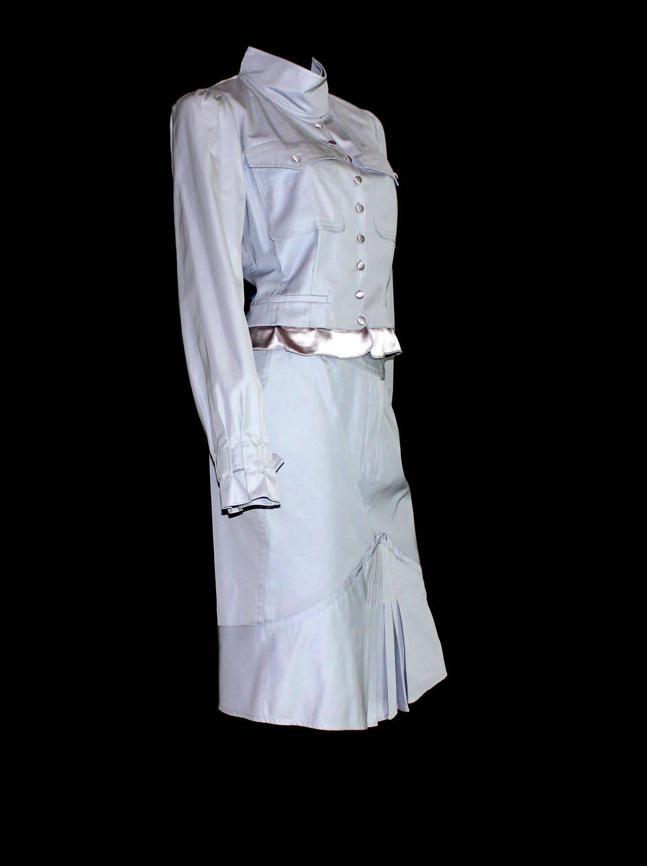 Stunning Yves Saint Laurent Skirt Suit
Designed by Tom Ford for his collection for YSL 
Spring / Summer 2003
Pleated Skirt
Beautiful satin silk buttons and trimming
Partially lined
Made in France
Size 38
Retailed at 5499$
Dry Clean Only
