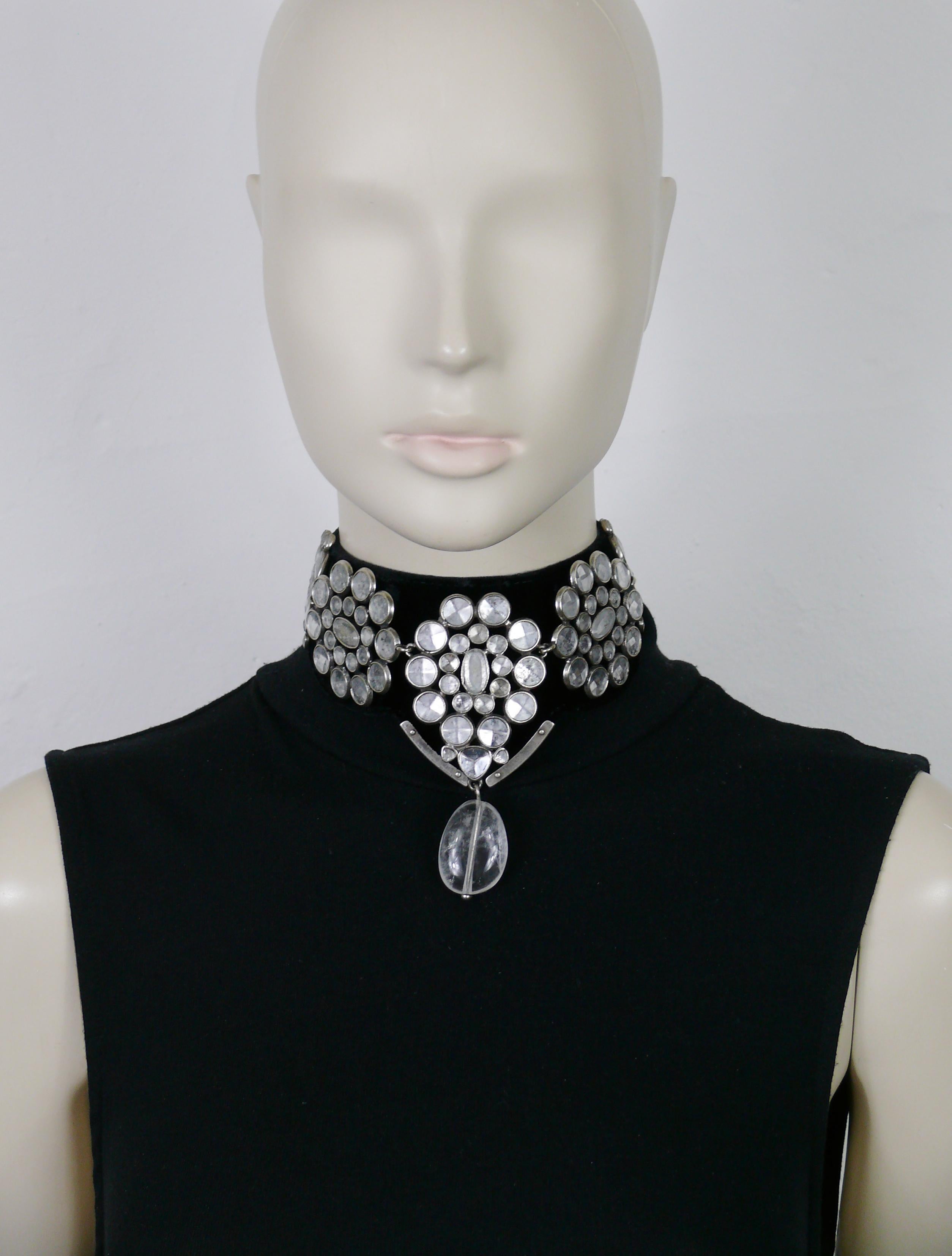 YVES SAINT LAURENT RIVE GAUCHE by TOM FORD black velvet choker necklace featuring antiqued silver toned elements embellished with acrylic aged effect prims and a rock crystal drop. 

YVES SAINT LAURENT Fall/Winter 2002 collection.

Velvet ribbons