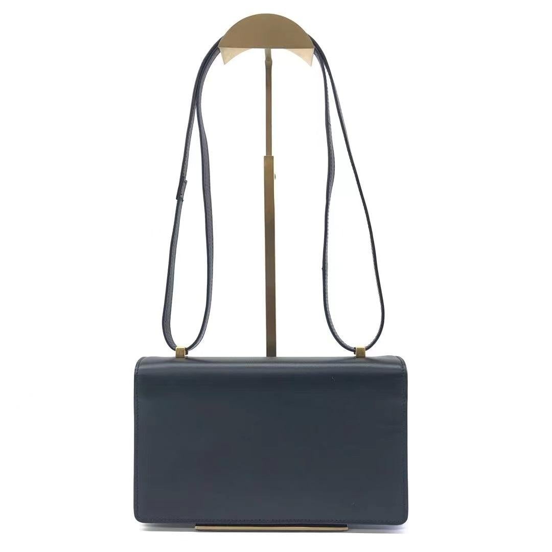 Yves Saint Laurent YSL Calfskin Small Dylan Shoulder Bag Black

The Yves Saint Laurent YSL Calfskin Small Dylan Shoulder Bag in Black is a genuine and stylish option. Its finely crafted smooth calfskin leather construction and black leather shoulder