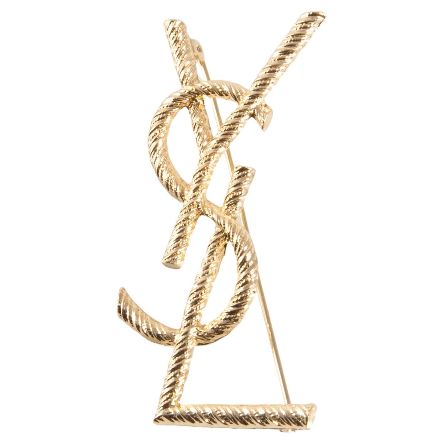 Yves Saint Laurent YSL Cassandre Broche trenzado grande dorado