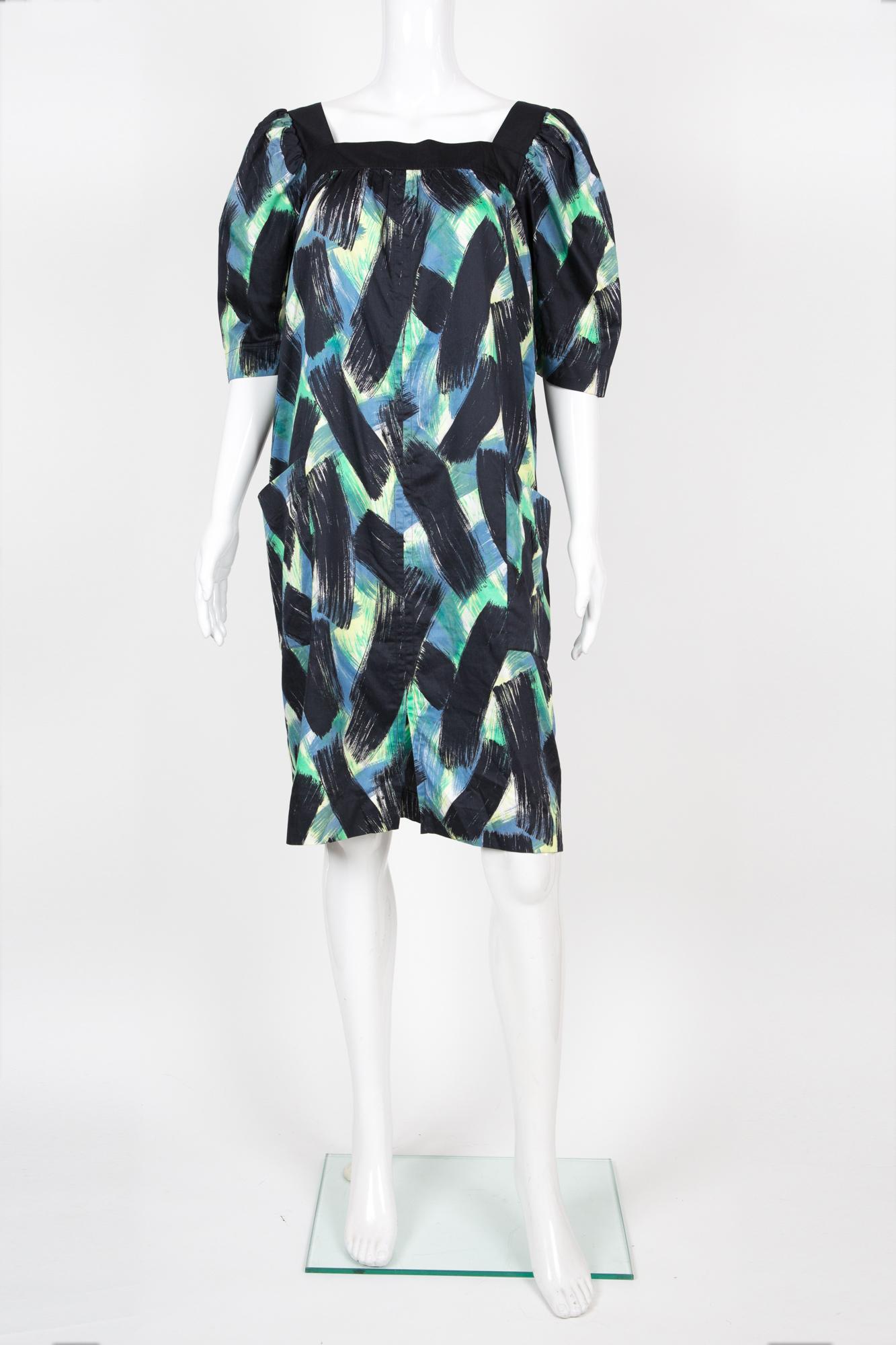 Yves Saint Laurent YSL cotton printed dress featuring a graphic print, black cotton finishing, pocket at sides, center back slits.
Circa 1990s
Composition: 100% cotton
Estimated size 38fr/US6 /UK10
Made in France. 
In good vintage condition. 
We