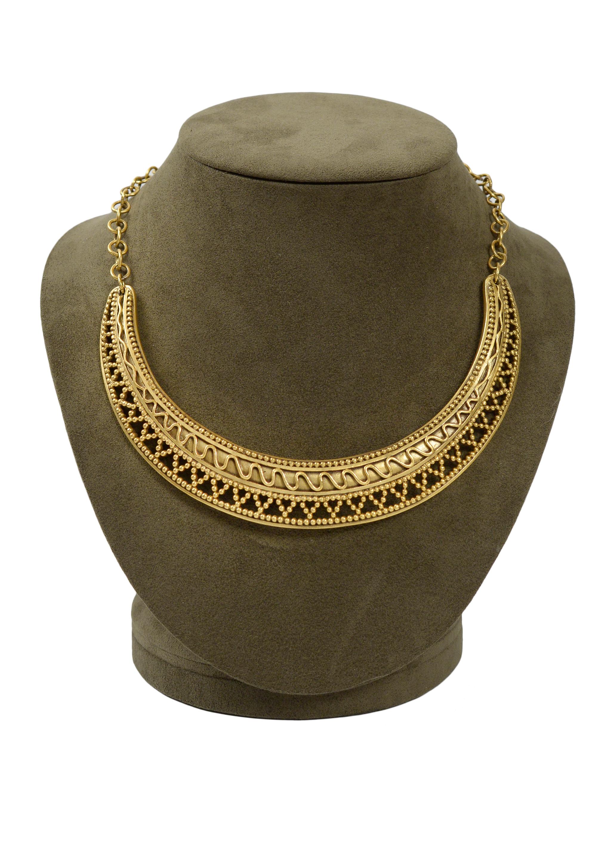 Resurrection Vintage is excited to offer a vintage Yves Saint Laurent YSL metal gold-tone crescent collar necklace with bead detail and etching. Stamped YSL. 

Yves Saint Laurent
One Size 
Metal
Stamped YSL
Excellent Vintage Condition
Authenticity