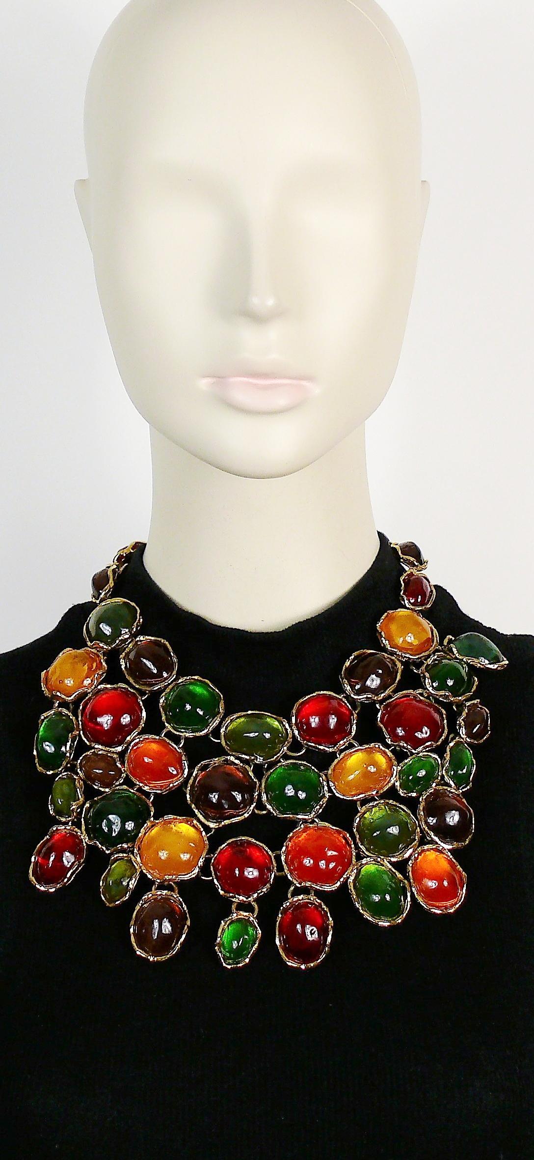YVES SAINT LAURENT vintage rare dramatic multi jewelled plastron necklace featuring vibrant multi colour poured resin cabochons in a gold toned setting.

Spring/Summer 1989 Collection, as seen on the YVES SAINT LAURENT Fashion Show.

One of the most