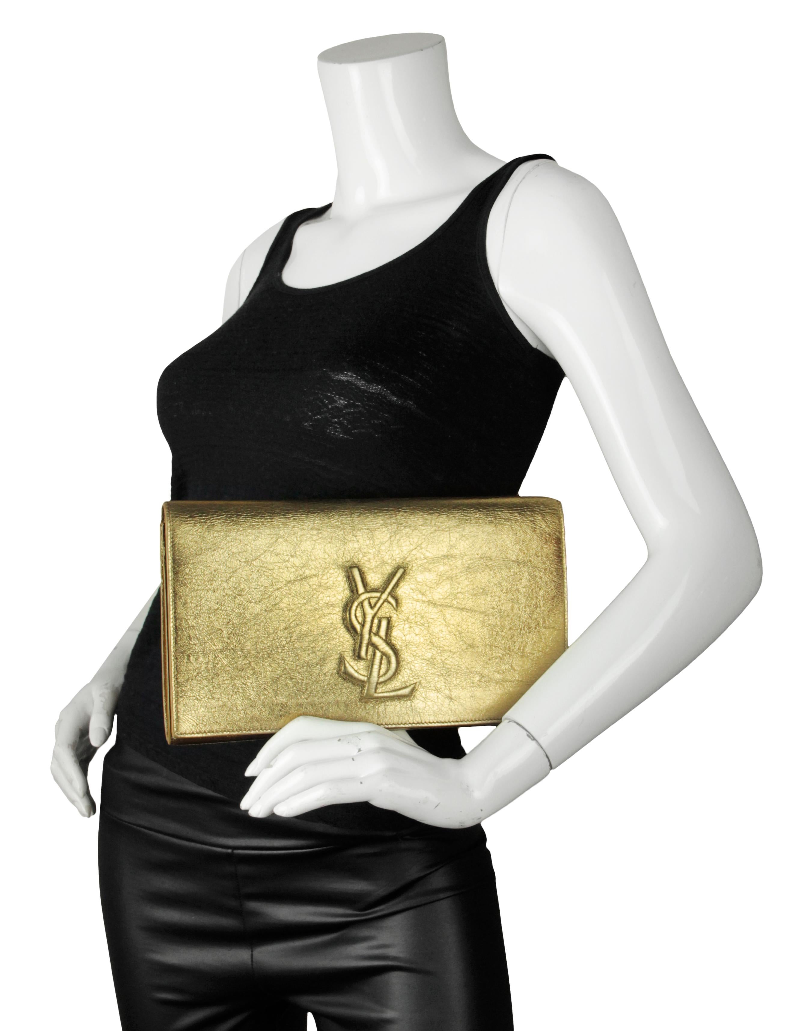 Yves Saint Laurent YSL Gold Large Belle De Jour Clutch Bag

Made In: Italy
Year of Production: 2015
Color: Dark gold
Materials: Glazed crinkled leather
Lining: Satin textile
Closure/Opening: Magnetic snap
Interior Pockets: Patch pocket at