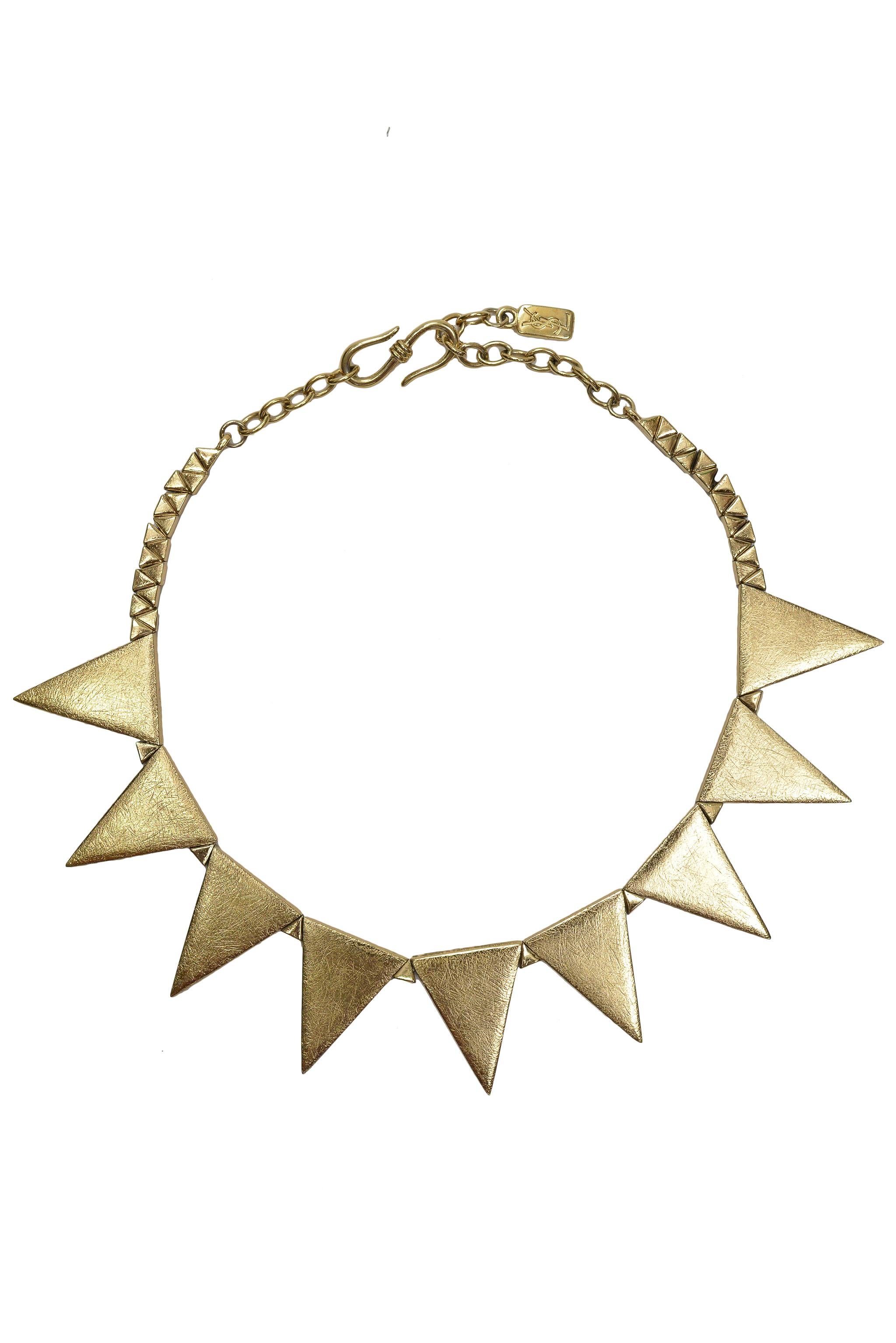 Resurrection Vintage is excited to present a vintage Yves Saint Laurent YSL gold-tone spike necklace that features an adjustable link chain, and hook closure. Signed YSL.

Yves Saint Laurent
One Size
Metal
1980s
Signed YSL
Excellent Vintage
