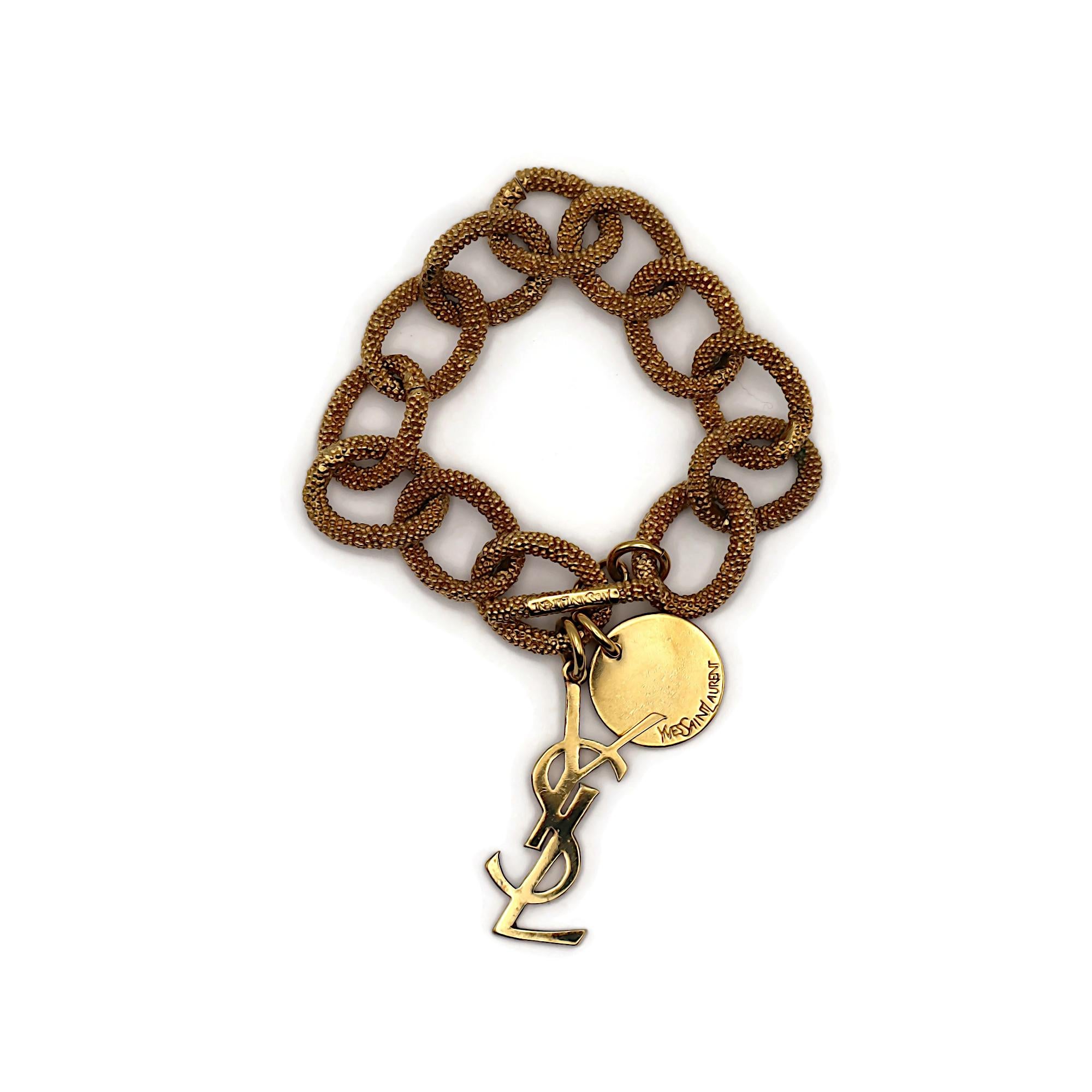 YVES SAINT LAURENT YSL Bracciale con catena e logo in oro In condizioni buone in vendita a Nice, FR