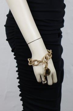 YVES SAINT LAURENT YSL Gold Tone Chain Logo Charm Bracelet