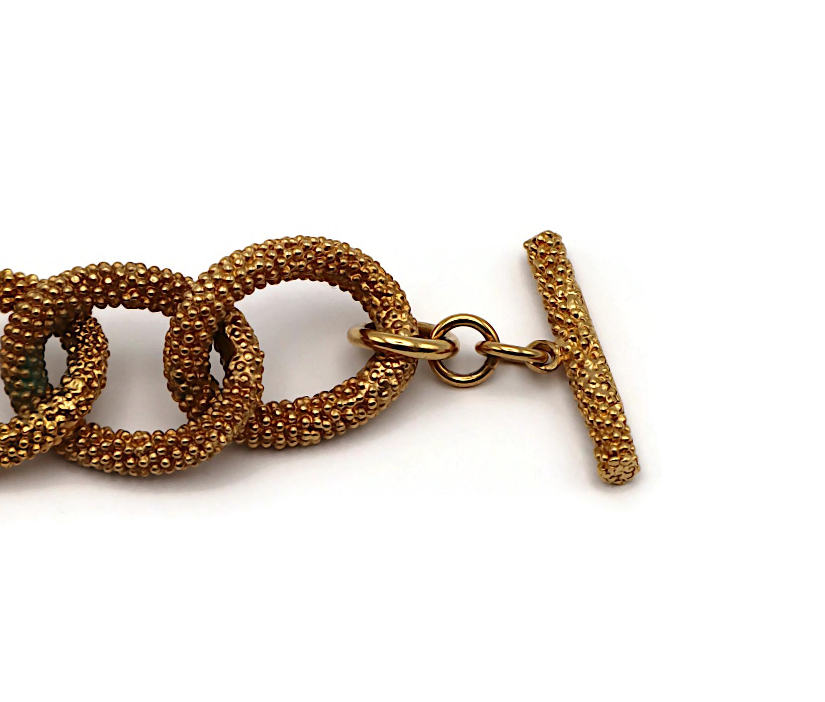 Donna YVES SAINT LAURENT YSL Bracciale con catena e logo in oro in vendita