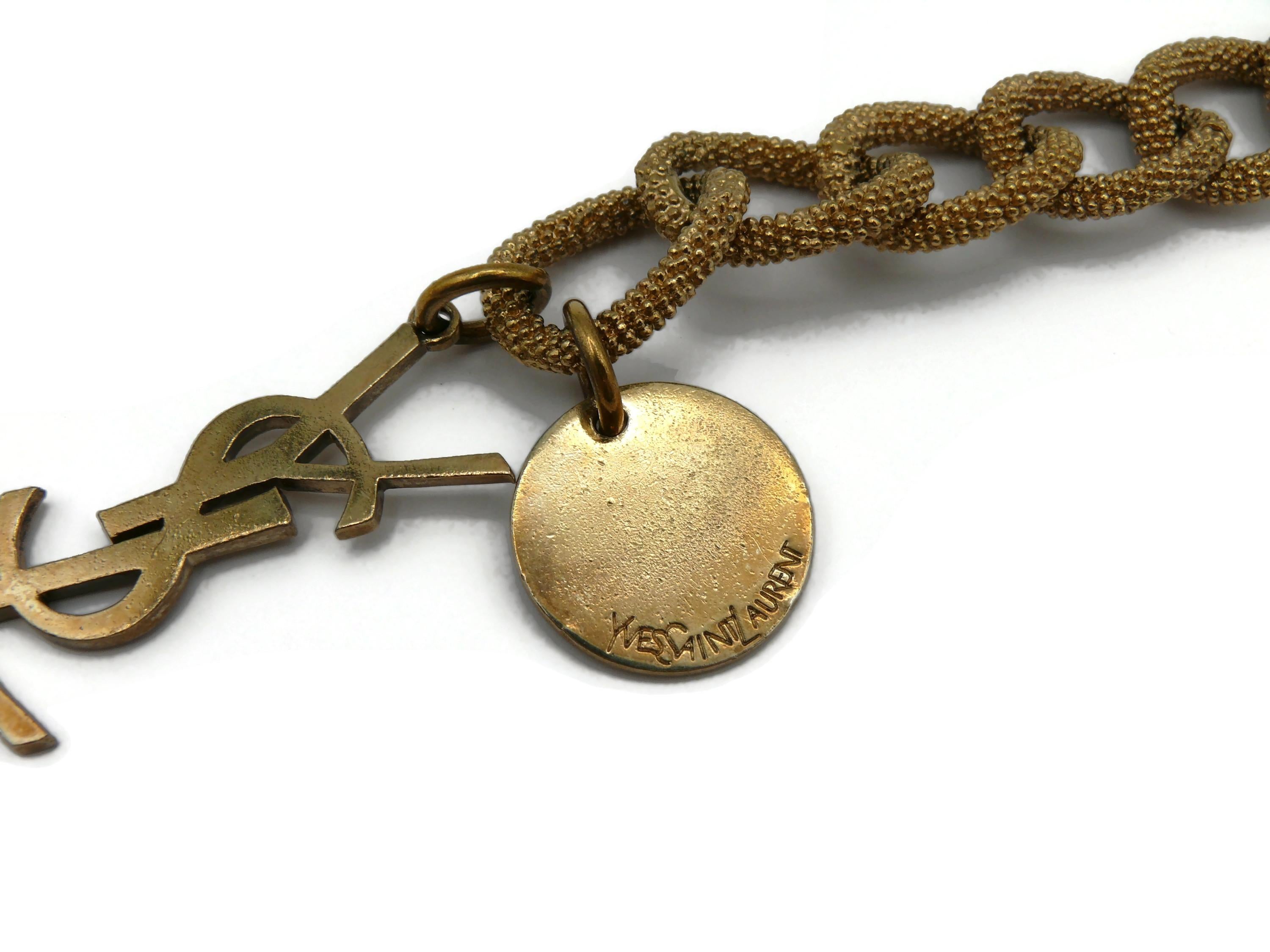 YVES SAINT LAURENT YSL Gold Tone Chain Logo Charm Bracelet In Good Condition For Sale In Nice, FR