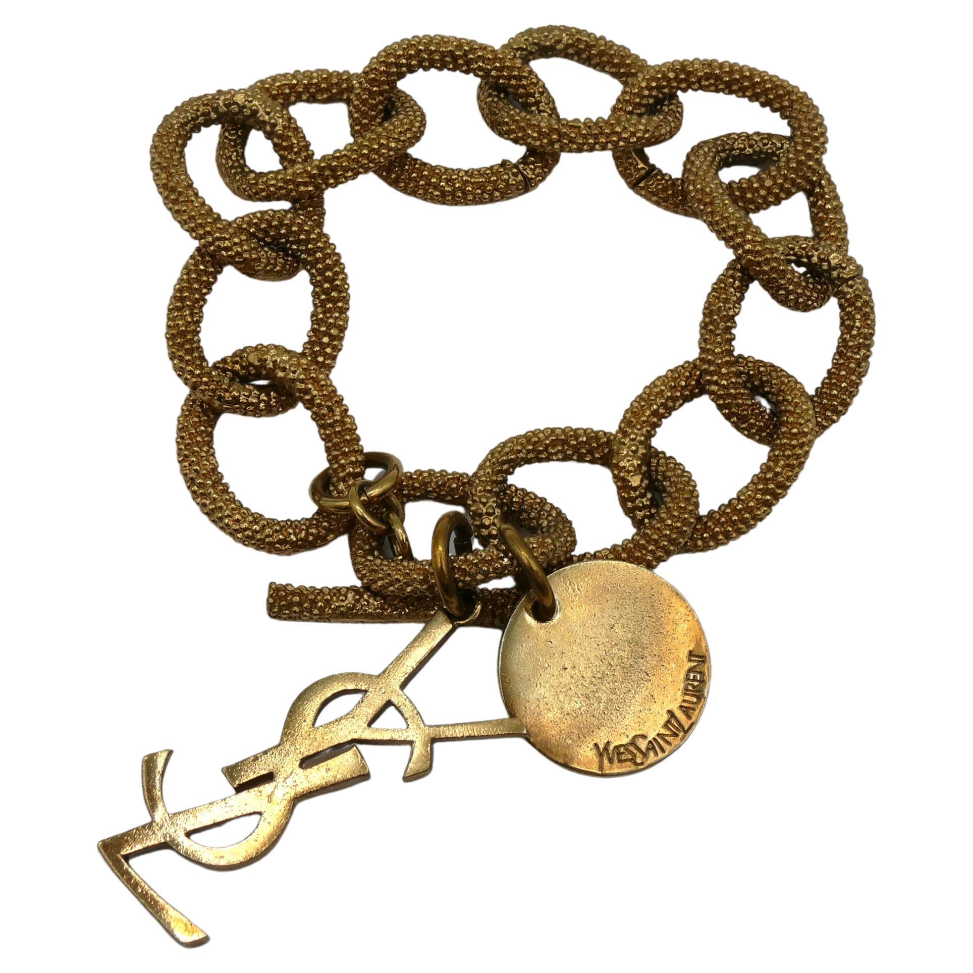 YVES SAINT LAURENT YSL Gold Tone Chain Logo Charm Bracelet For Sale