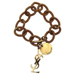 YVES SAINT LAURENT YSL Gold Tone Chain Logo Charm Bracelet