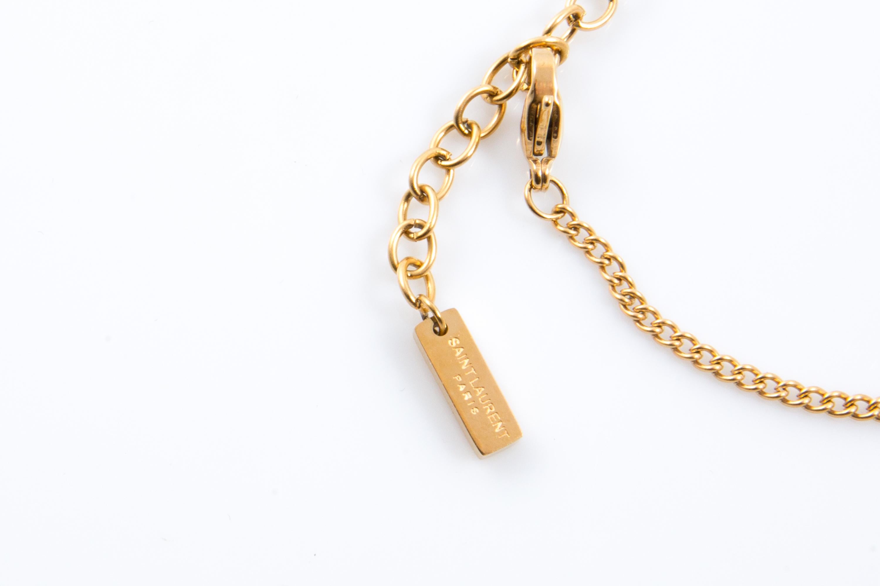 Yves Saint Laurent Yves Saint Laurent Cassandre bracelet en or Pour femmes en vente