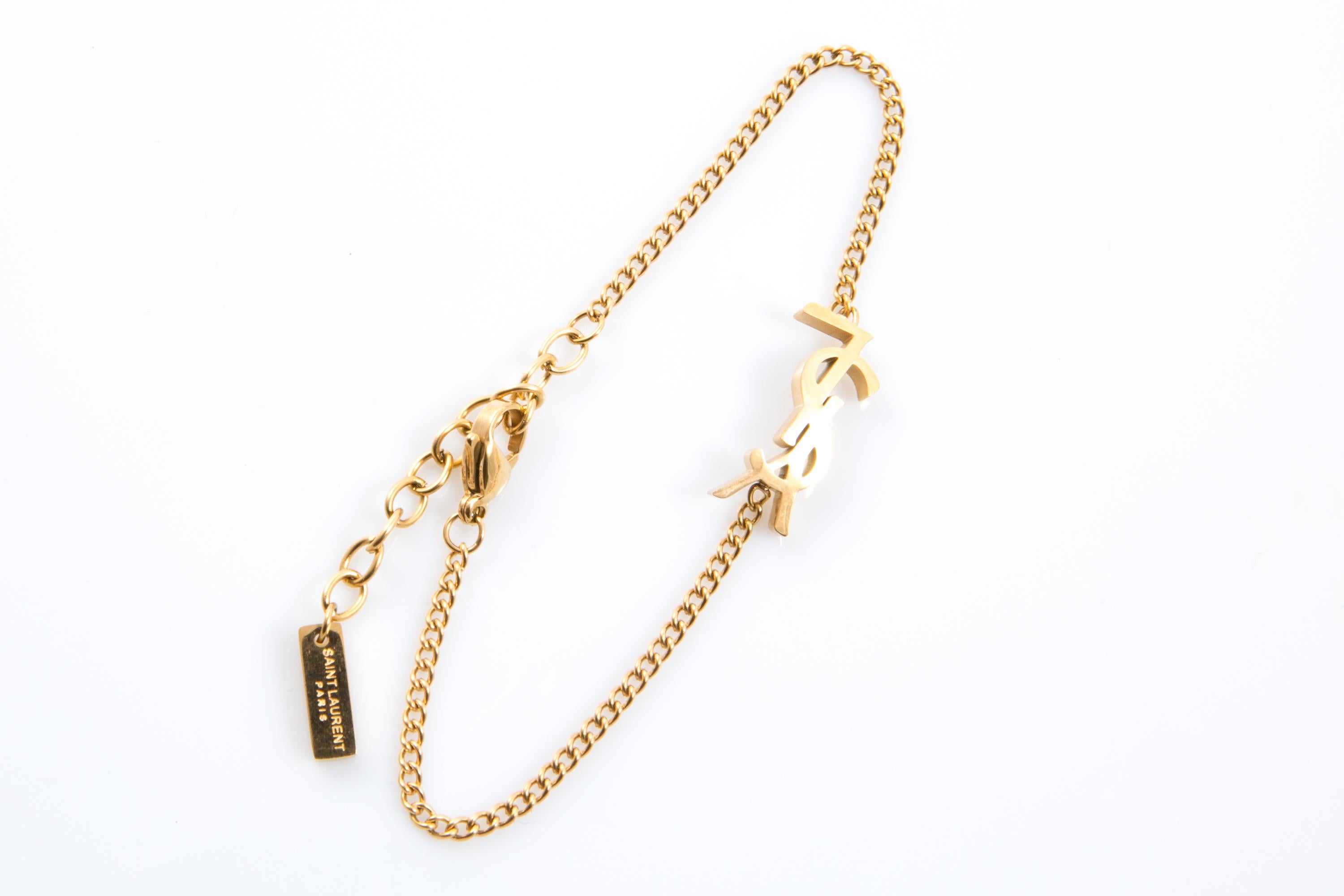 Yves Saint Laurent Yves Saint Laurent Cassandre bracelet en or en vente 1