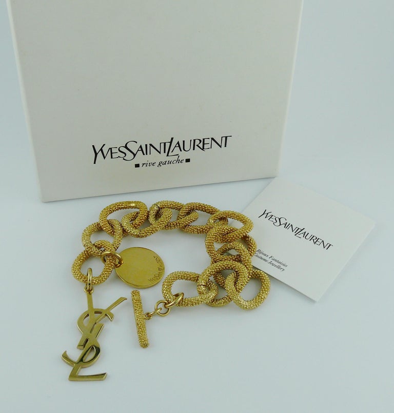 Yves Saint Laurent YSL Gold Toned Chain Logo Charm Bracelet at 1stDibs ...
