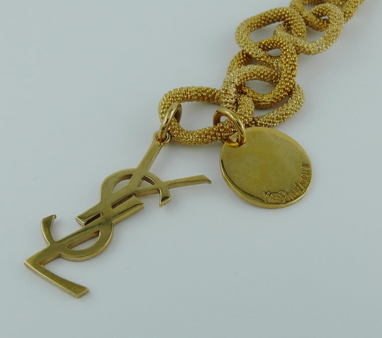 Yves Saint Laurent YSL Gold Toned Chain Logo Charm Bracelet at 1stDibs ...
