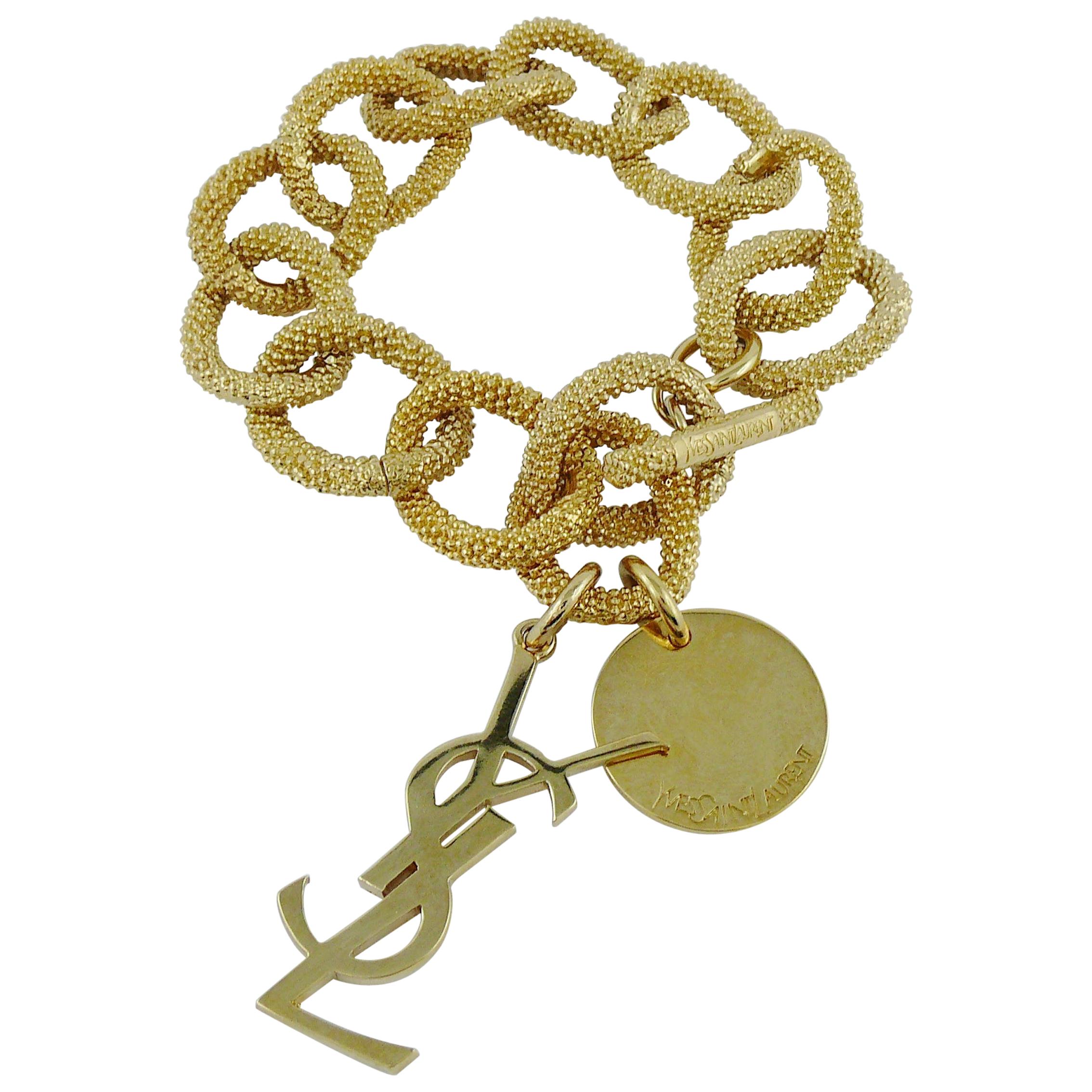 Yves Saint Laurent YSL Gold Toned Chain Logo Charm Bracelet