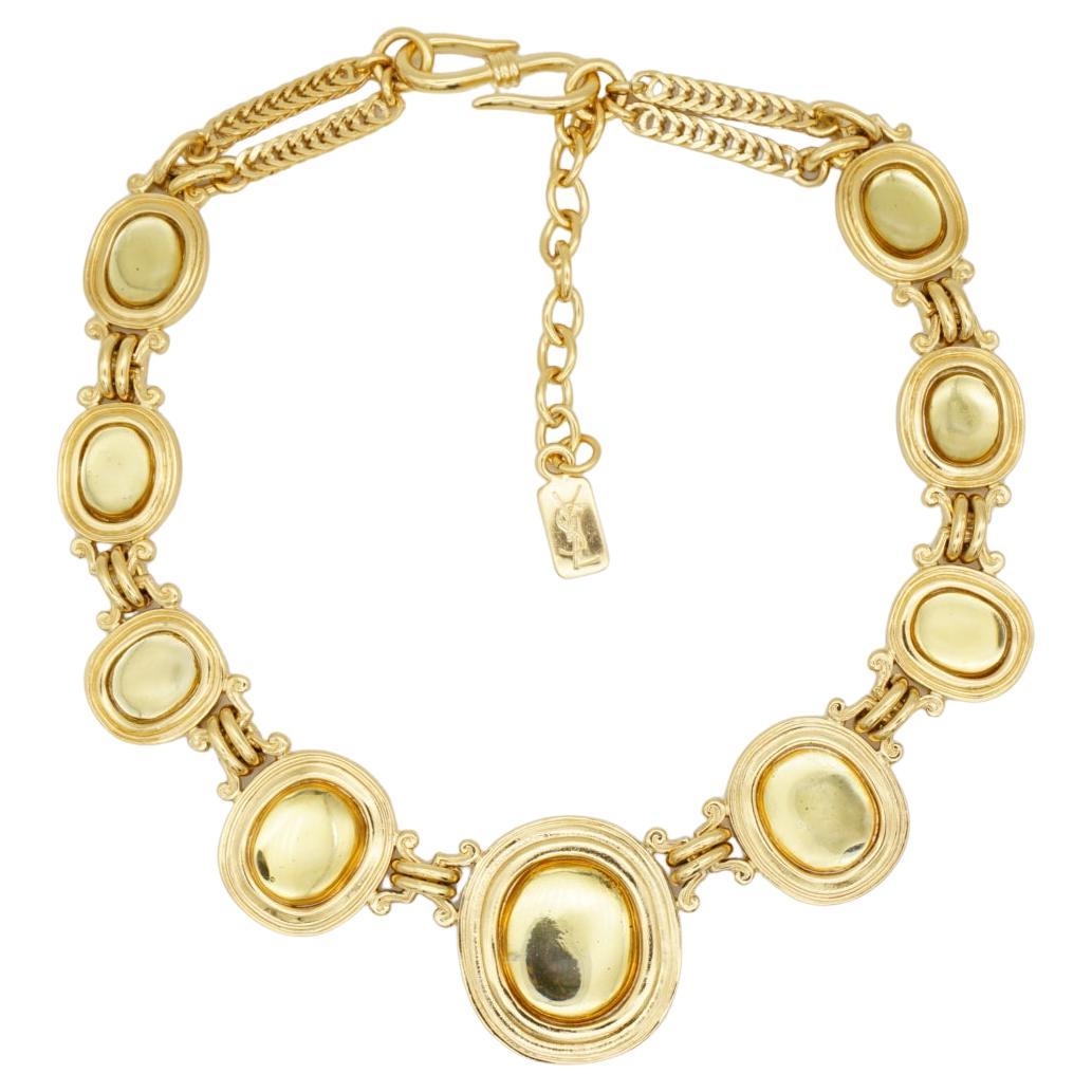 Yves Saint Laurent YSL Arty 1980s Vintage Gripoix Citrin Topas Gelb Oval Cabochon Anhänger Charms Kristalle Chunky Double Weizen Kette Modernist Elegantes Collier, vergoldet

Sehr guter Zustand. Ganz neu. Einige kleine Blasen oder Flecken im