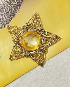 Yves Saint Laurent Broche étoile en or ajourée YSL grande taille en cristal jaune