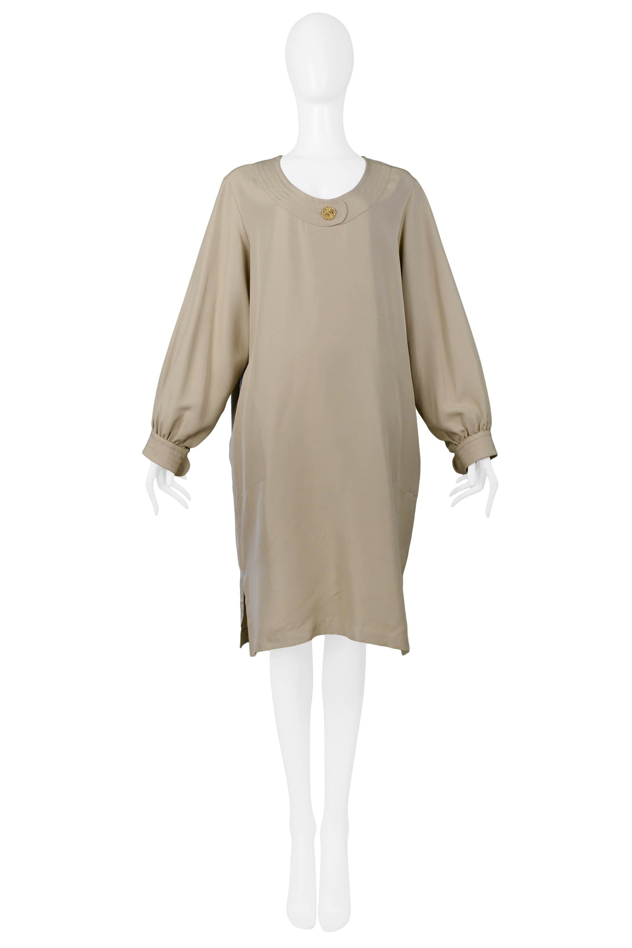 Resurrection Vintage is excited to offer a vintage Yves Saint Laurent khaki sack dress with gold buttons. Feels like silk or silk cotton. Very easy fit. Side pockets and slits.

Yves Saint Laurent
Size 4/6
Measurements: Measured Flat Not Stretched: