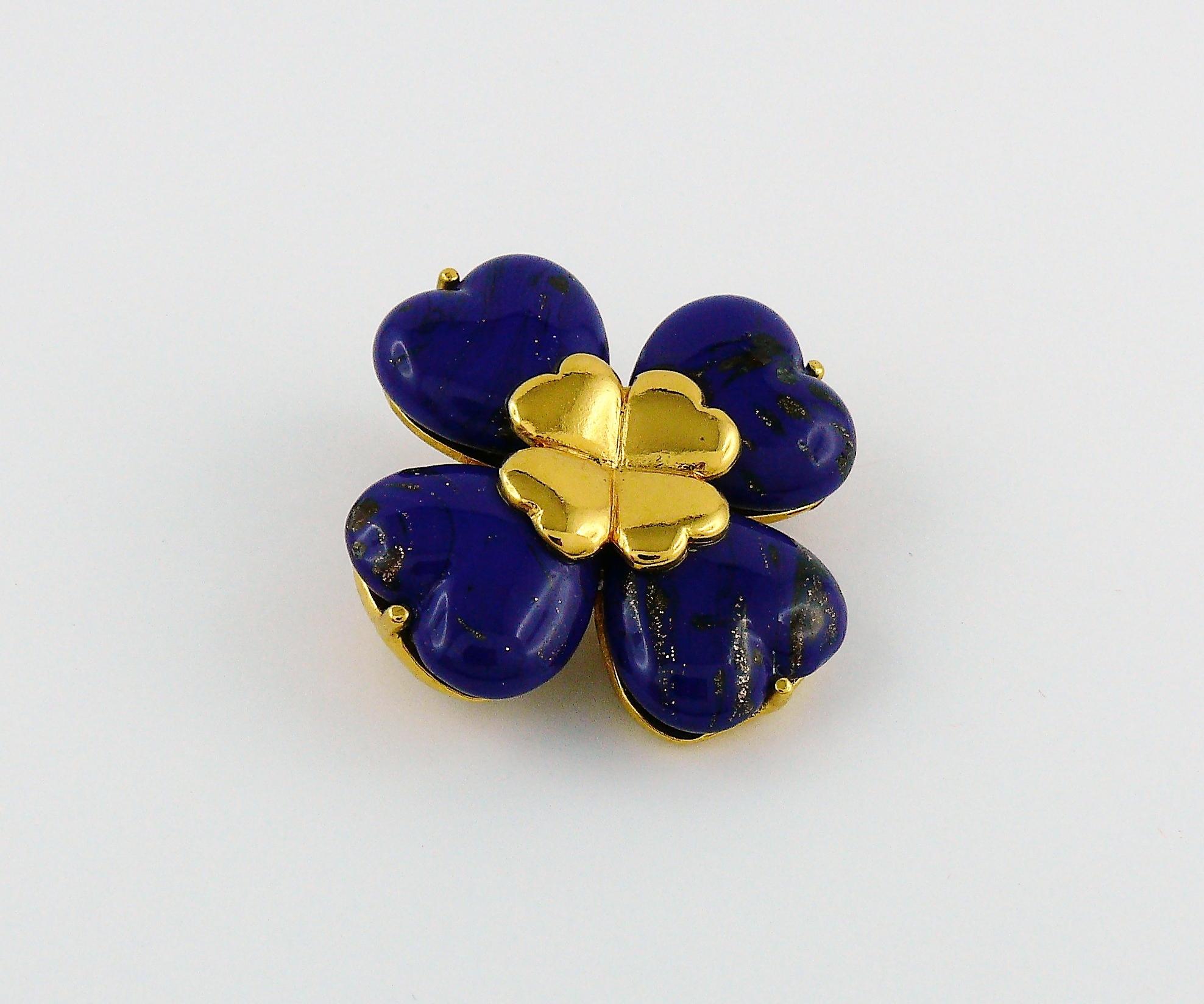 YVES SAINT LAURENT vintage gold toned clover brooch featuring heart shaped faux lapis lazuli glass cabochons.

Can be worn as a pendant.

Embossed YSL Made in France.

Indicative measurements : approx. 3.7 cm x 3.7 cm (1.46 inches x 1.46