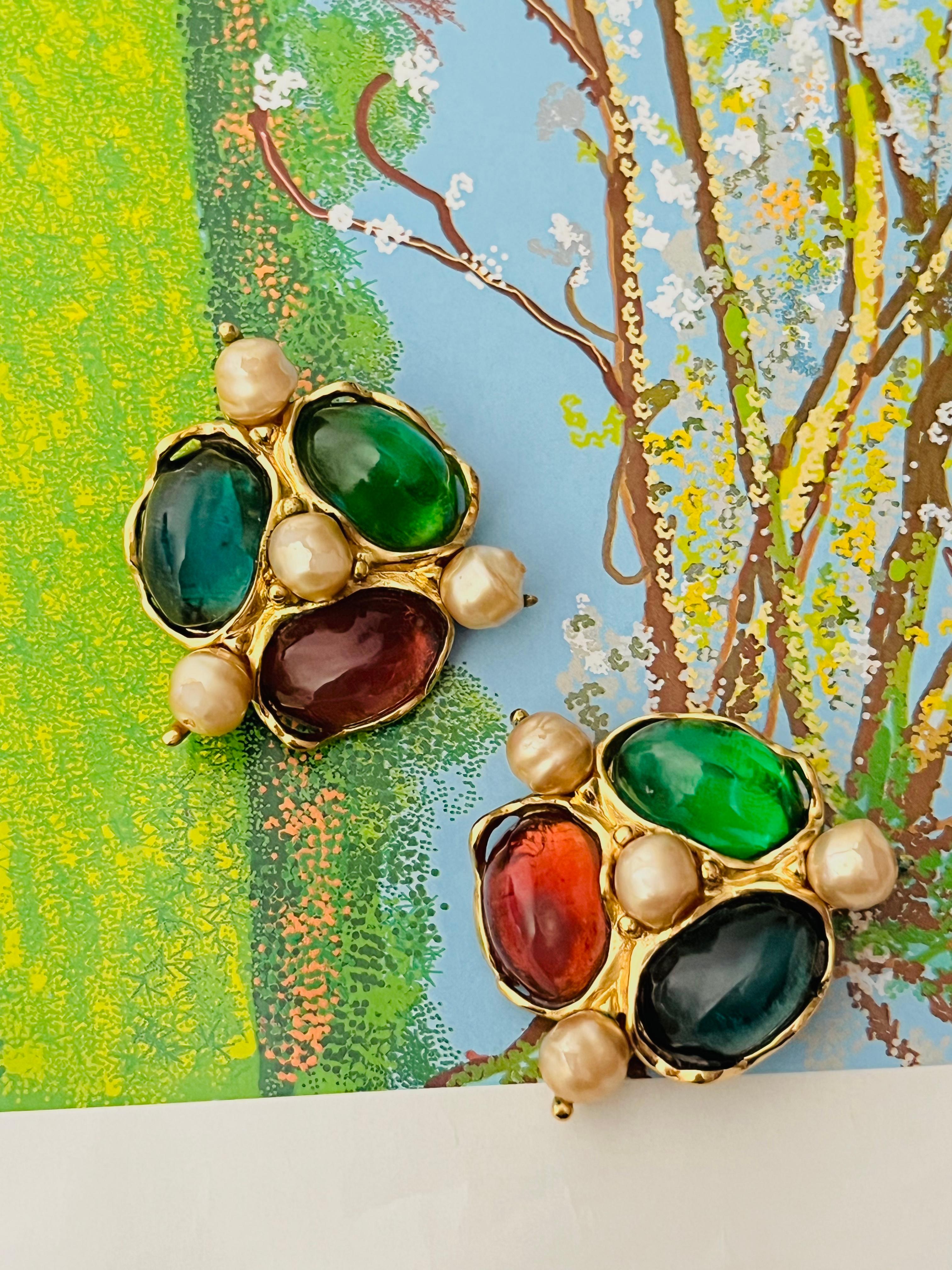 Yves Saint Laurent YSL Vintage Robert Goossens Arty Textured Large Gripoix Emerald Ruby Sapphire Green Blue Red Cabochon Crystals White Pearls Triangle Chunky Statement Clip Earrings, Gold Tone

Very good condition. All stones are good, peel off on