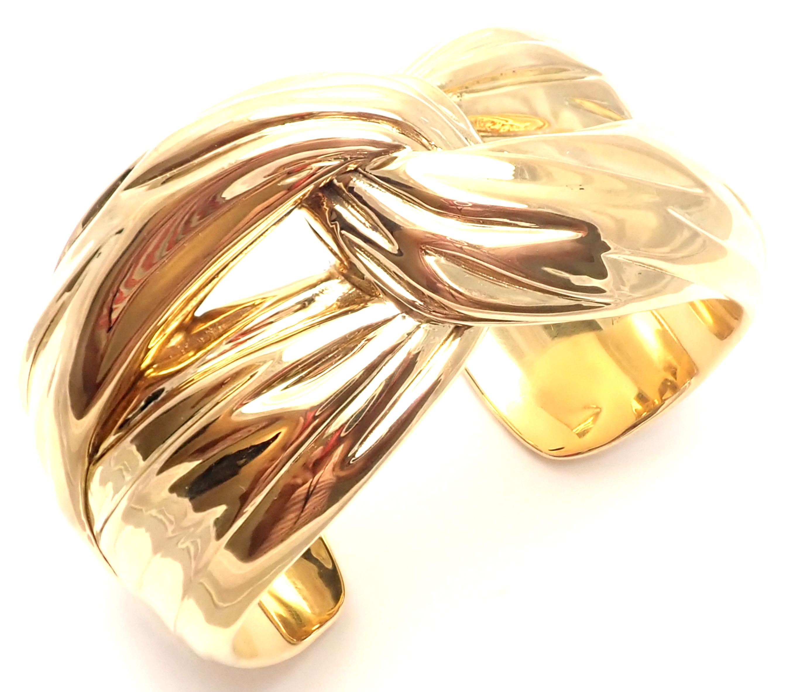 18k Solid Yellow Gold Cuff Bangle Bracelet by Yves Saint Laurent YSL Paris. 
Details: 
Length: 7.5 inches
Width: 1