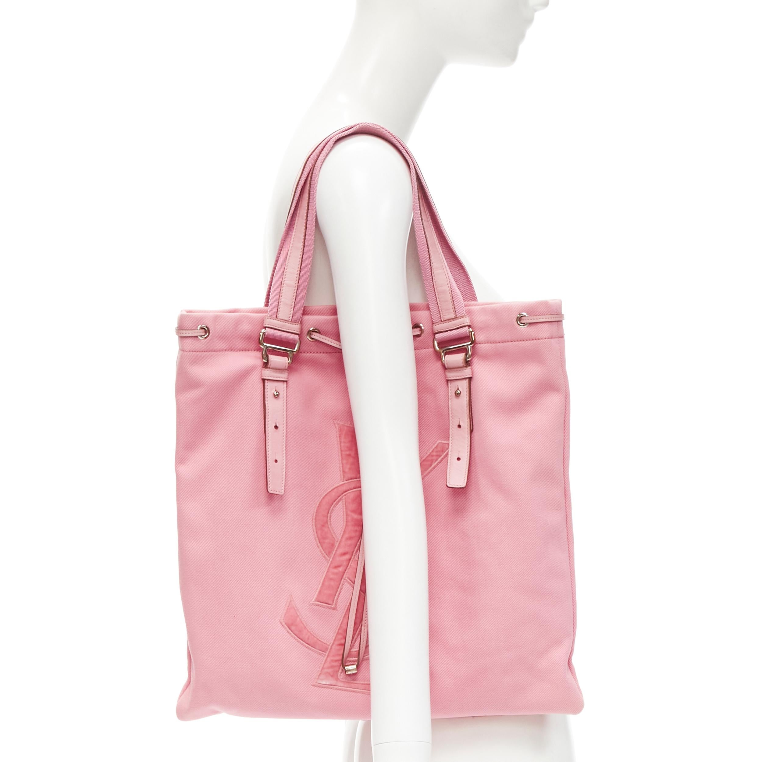 YVES SAINT LAURENT YSL pink canvas velvet logo applique drawstring tote bag
Brand: Yves Saint Laurent
Model: 121631 002122
Material: Canvas
Color: Pink
Pattern: Solid
Closure: Drawstring
Extra Detail: Leather drawstring at opening. Silver-tone